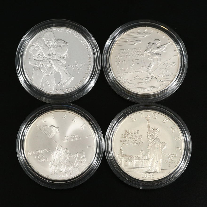 Four US Mint Commemorative Silver Dollars