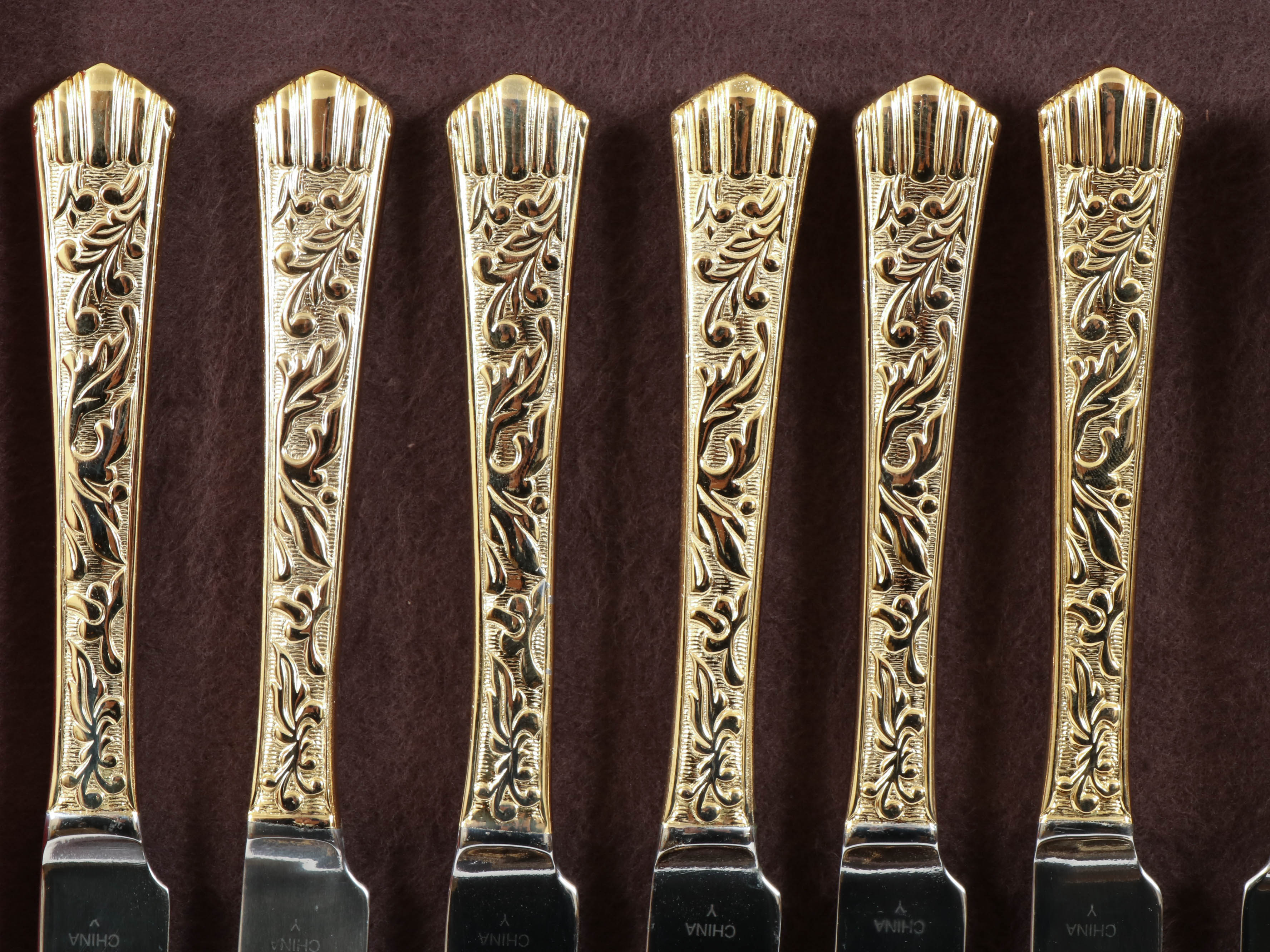 Gold-Tone Scrolling Leaf 12-Piece Flatware Set with Storage Case