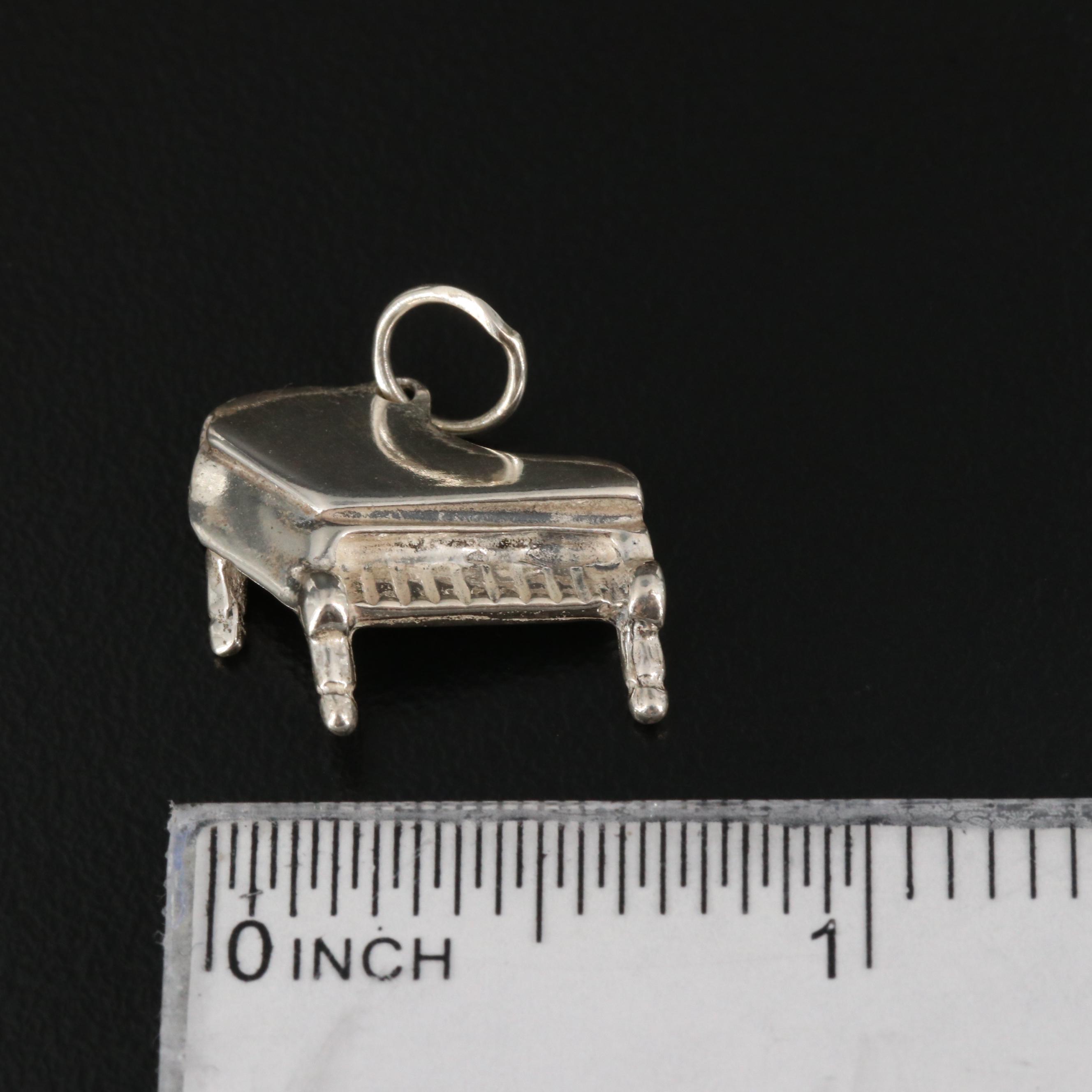 Sterling Silver Charm Bracelet with Piano and Ski Charms