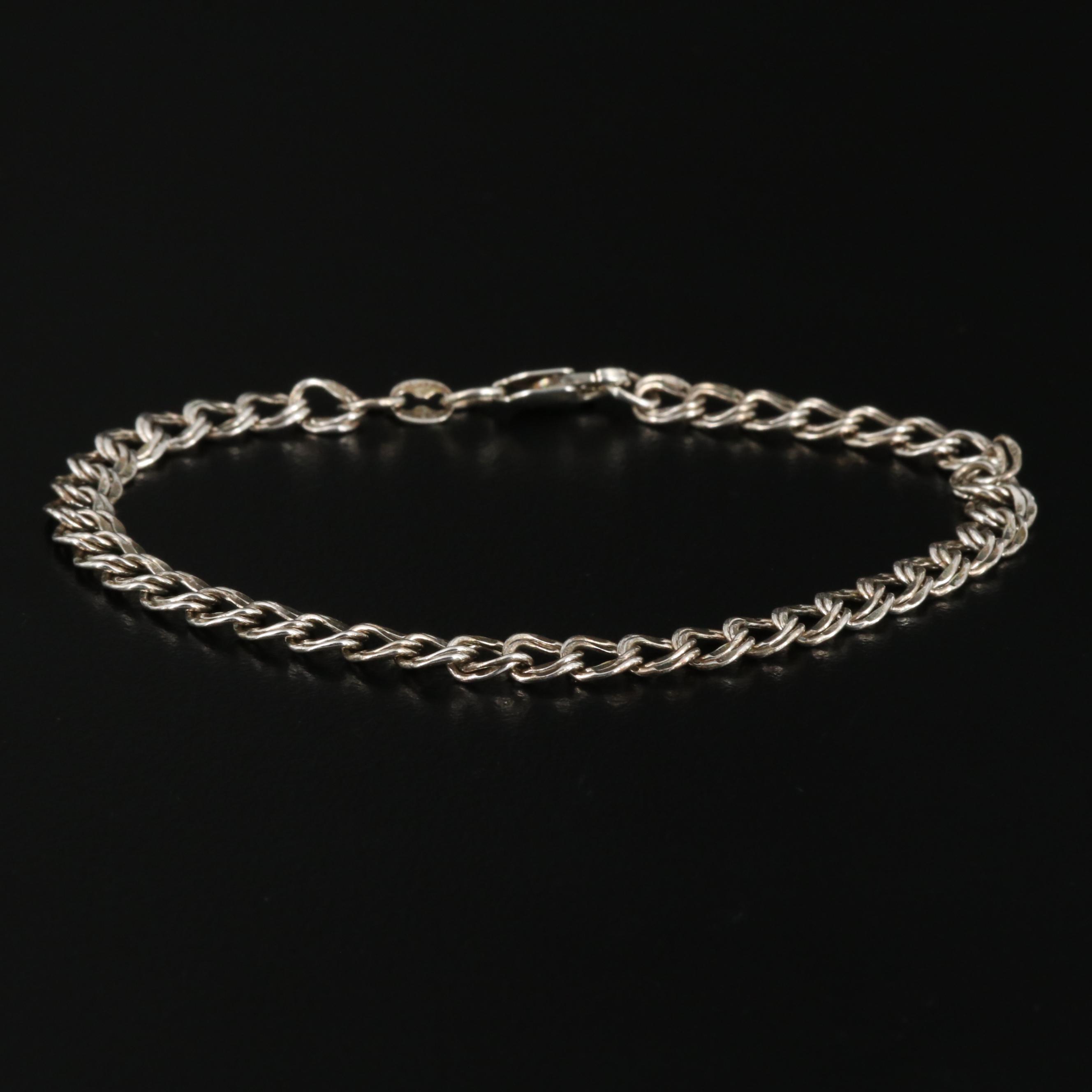 Sterling Silver Charm Bracelet with Piano and Ski Charms