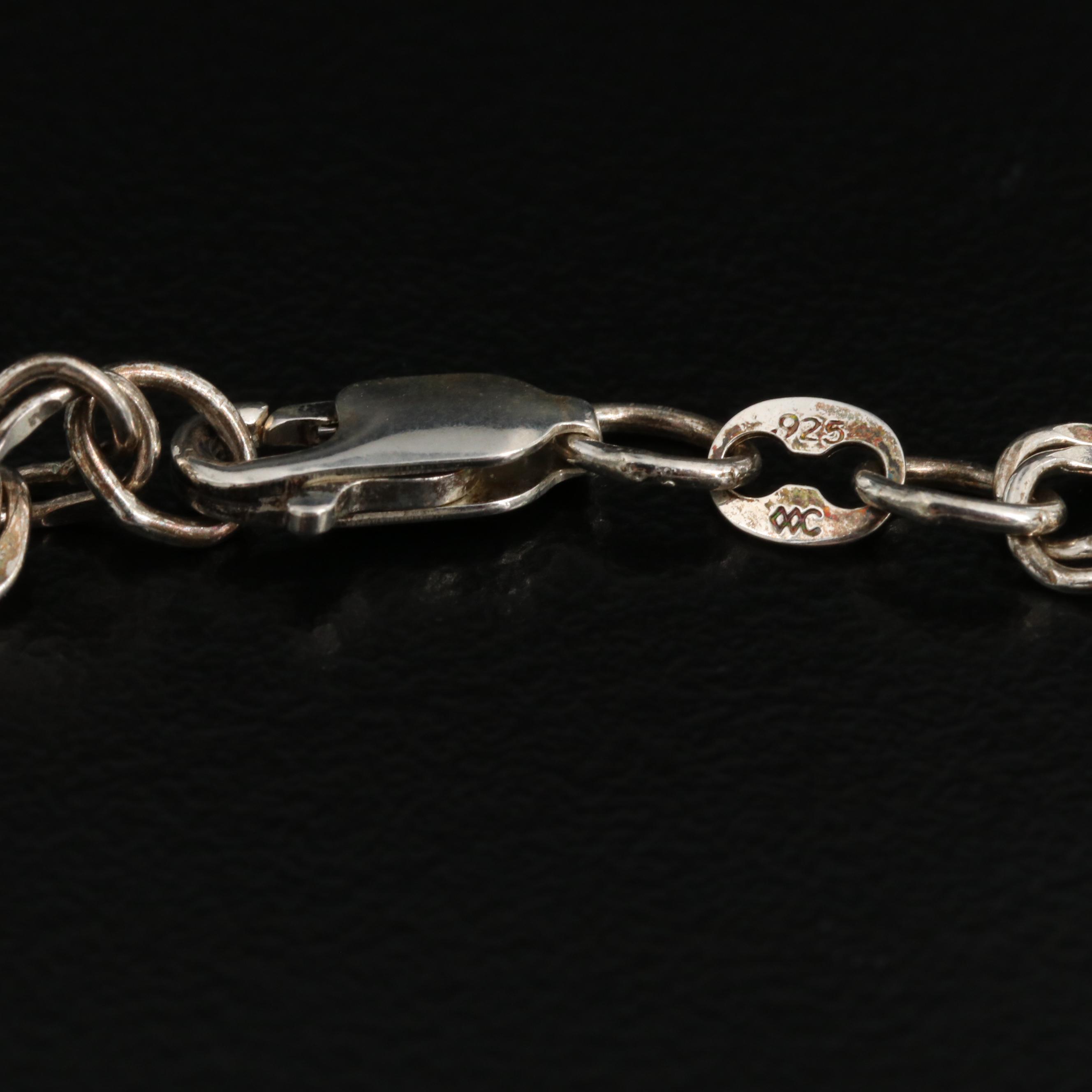 Sterling Silver Charm Bracelet with Piano and Ski Charms