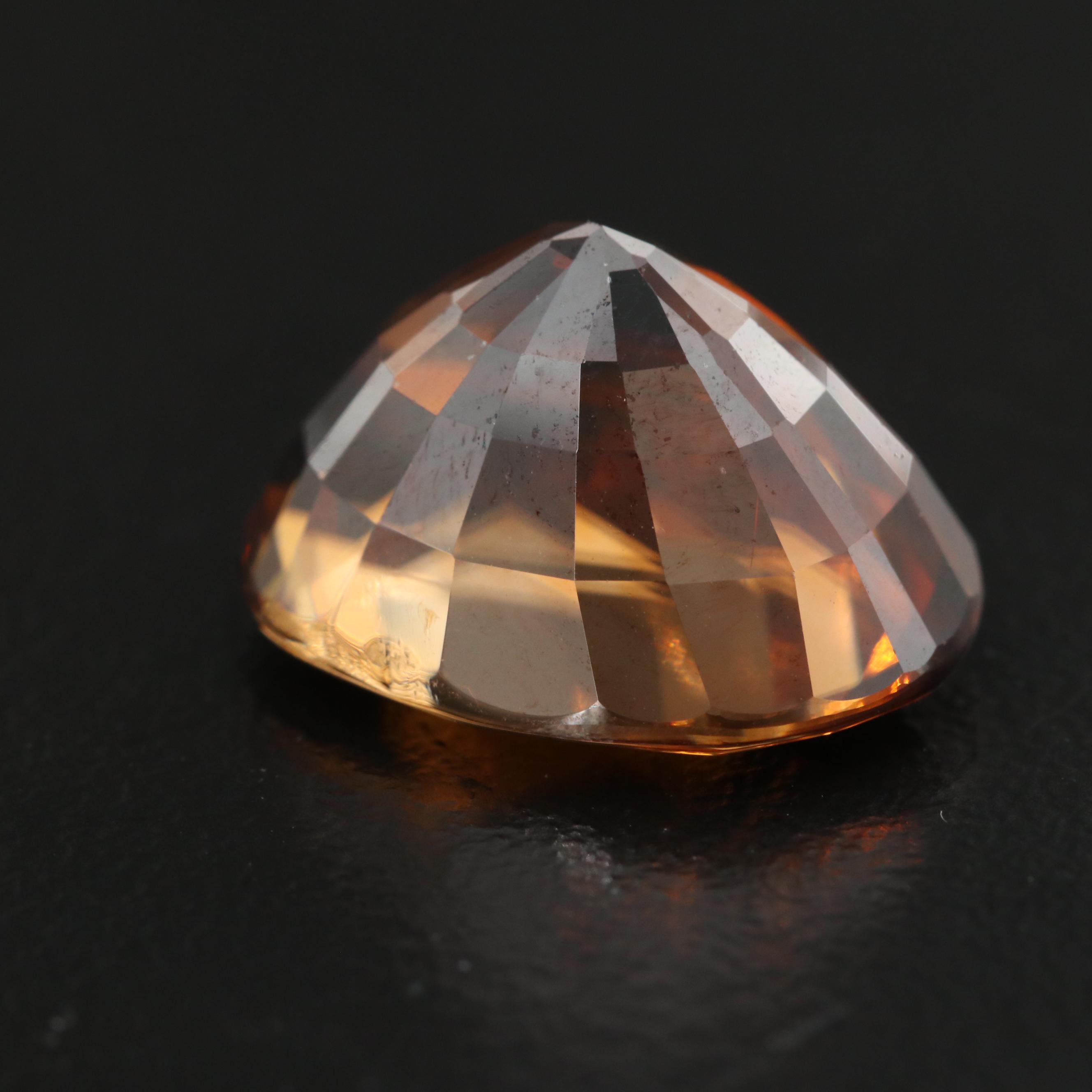 Loose 16.60 CT Oval Faceted Zircon