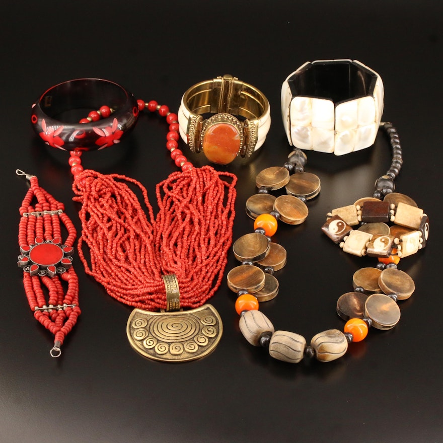 Assorted Wood and Gemstone Jewelry Featuring Tribal Designs