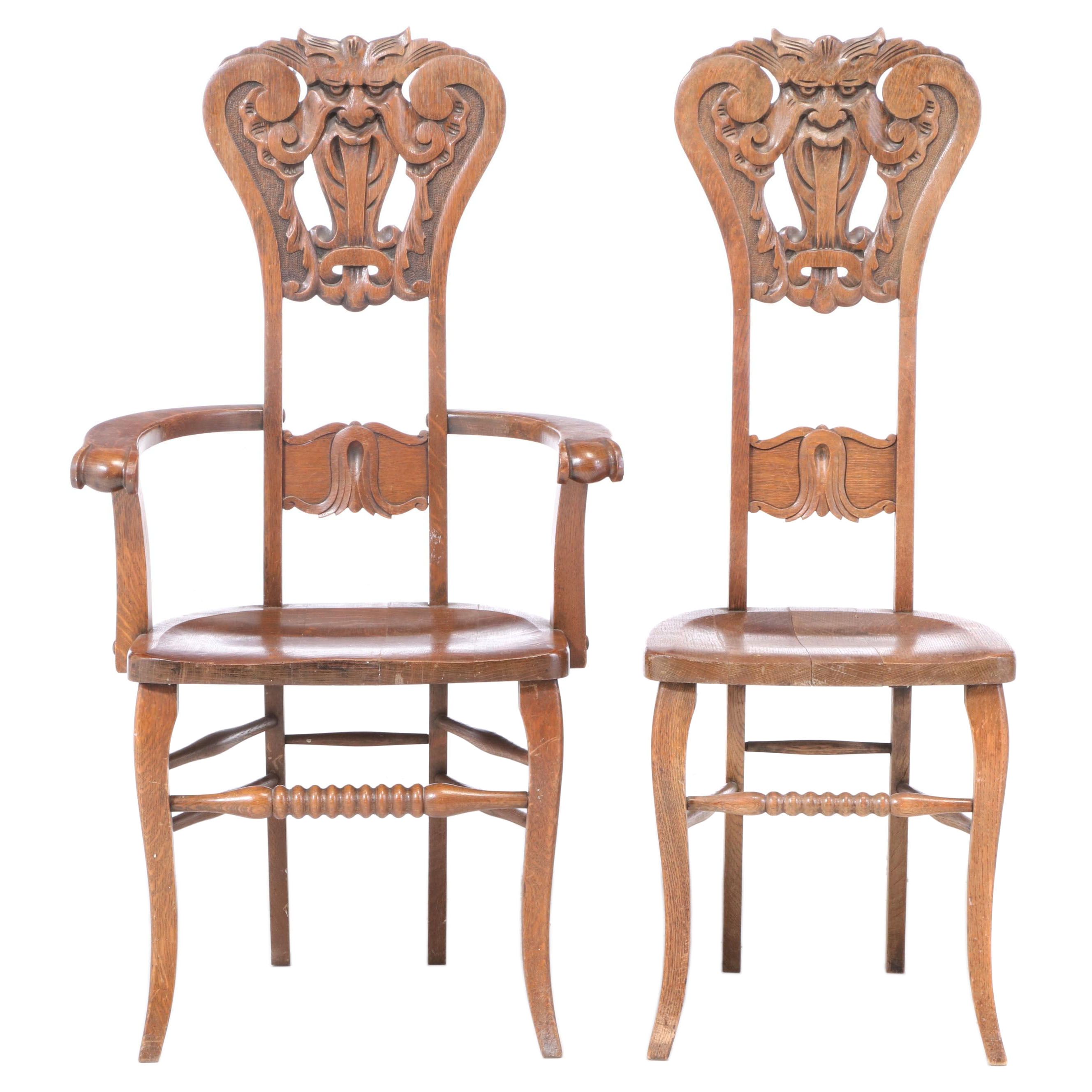 Two American Carved Oak "North Wind" Chairs, circa 1900