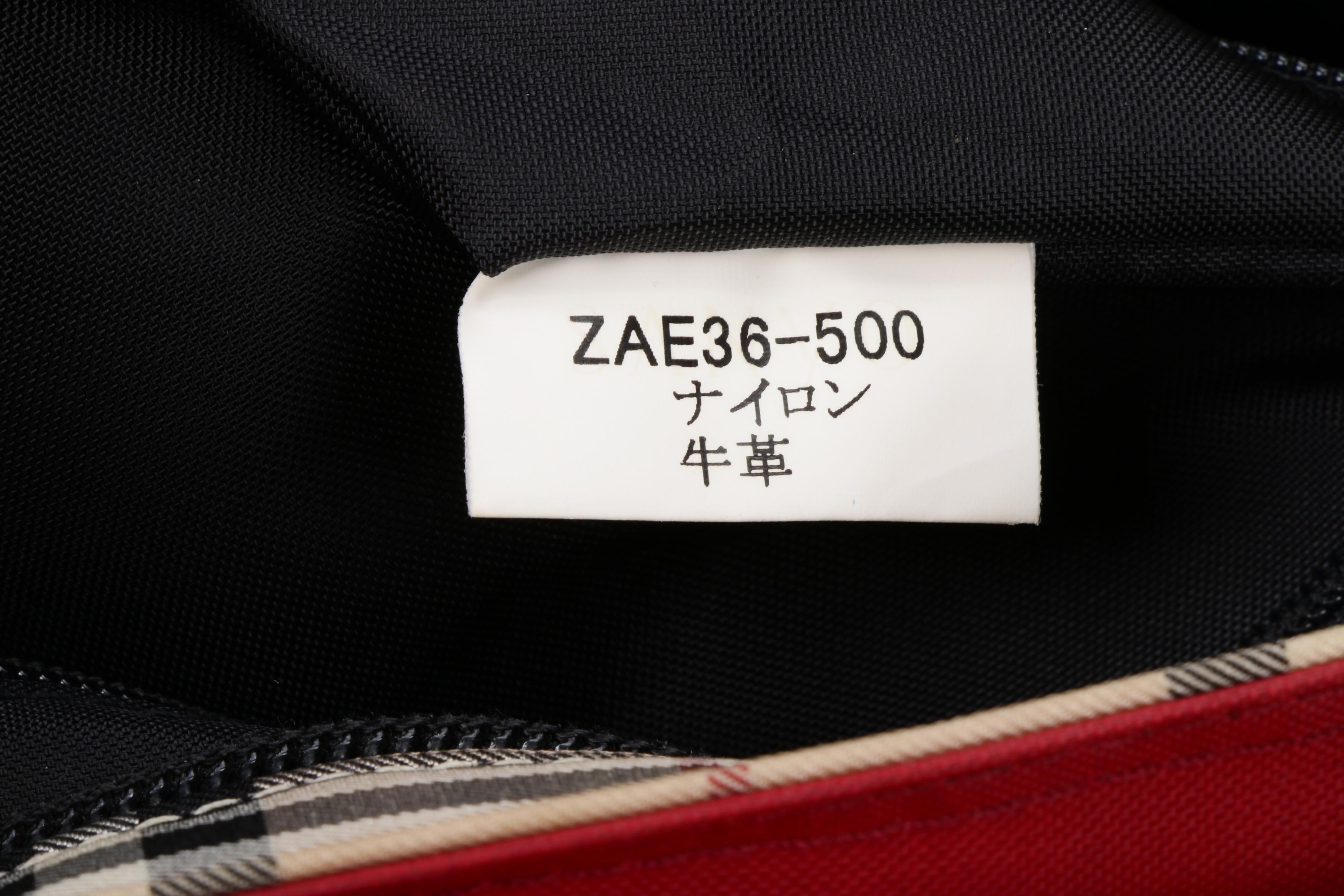 Burberry Blue Label Top Handle Bag in "Nova Check" Nylon and Leather