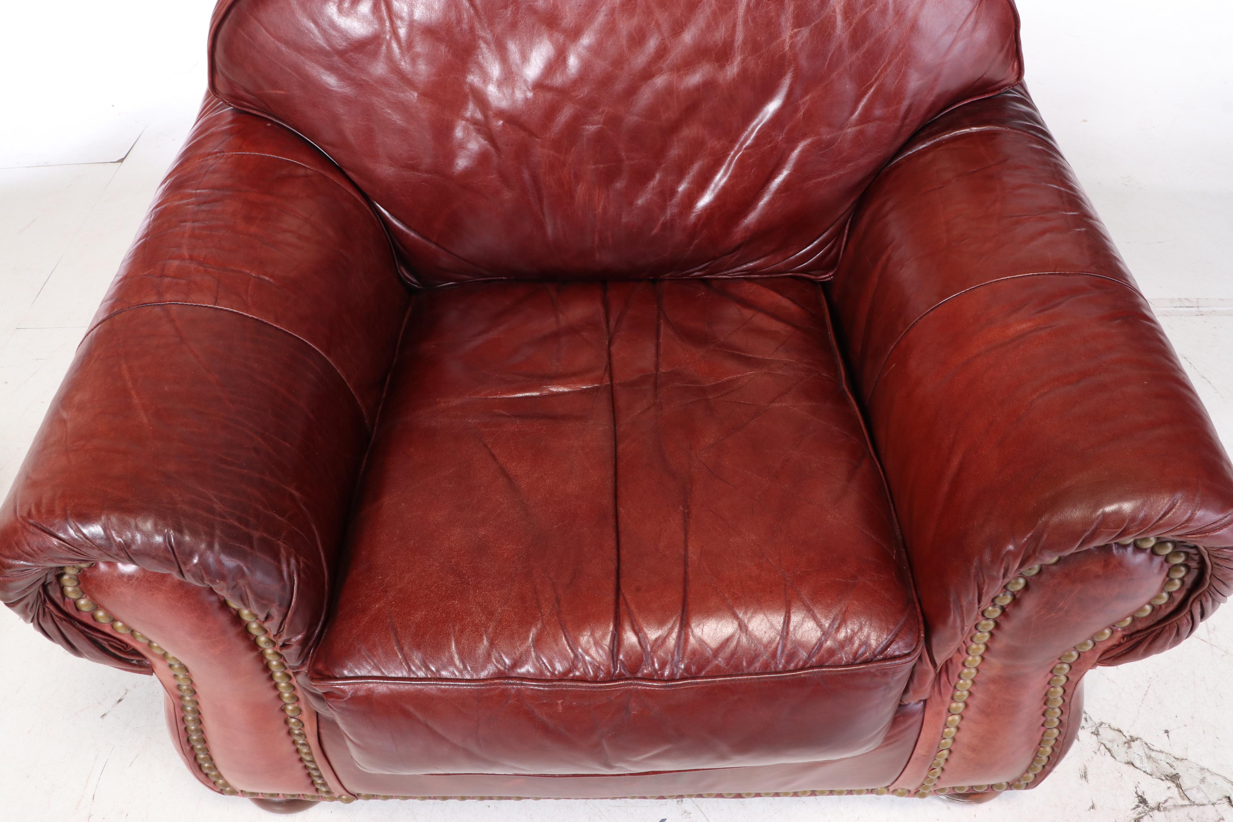 Robinson and Robinson Leather and Brass-Tacked Club Chair with Ottoman