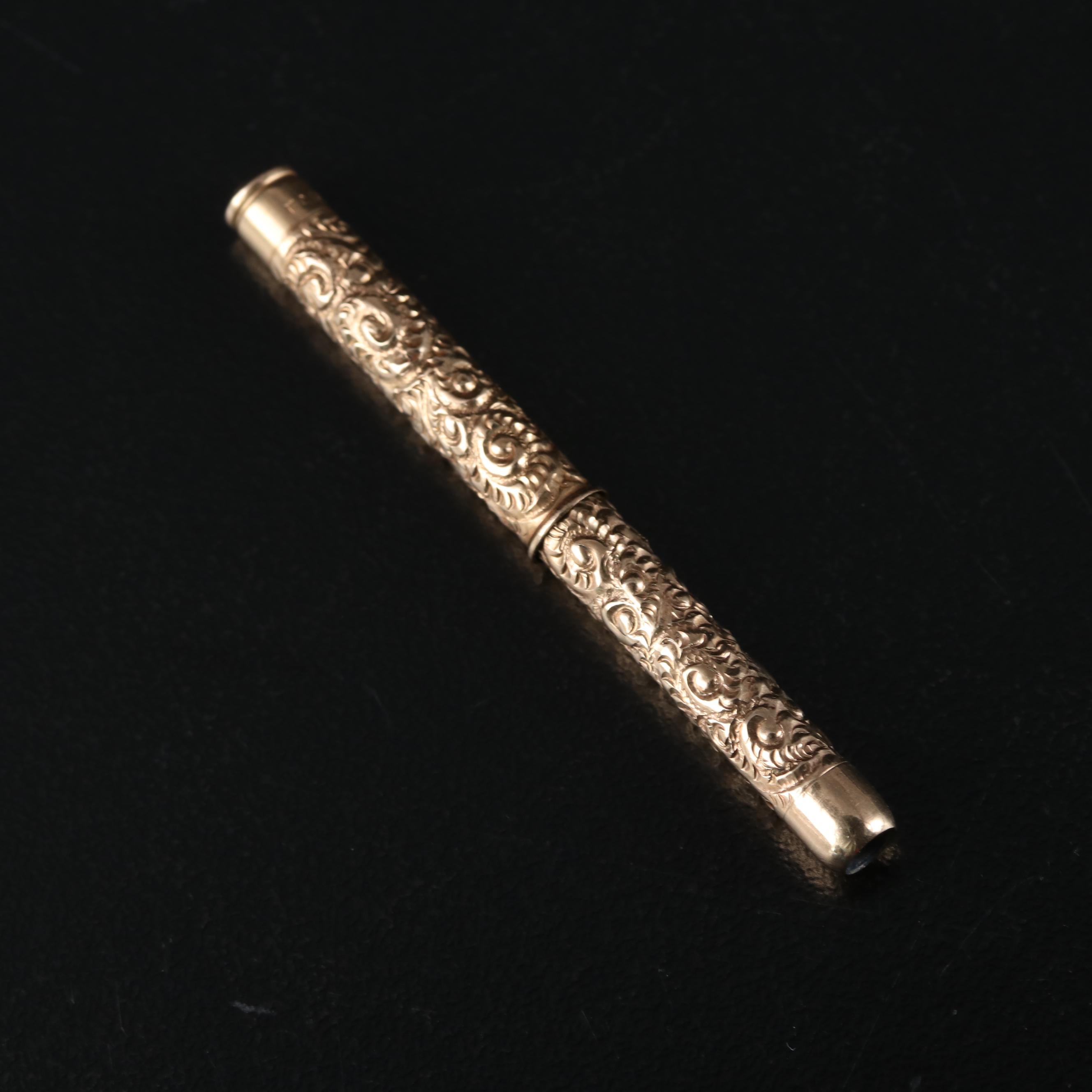 Late Victorian Fairchild Gold Tone Chased Metal Retractable Toothpick