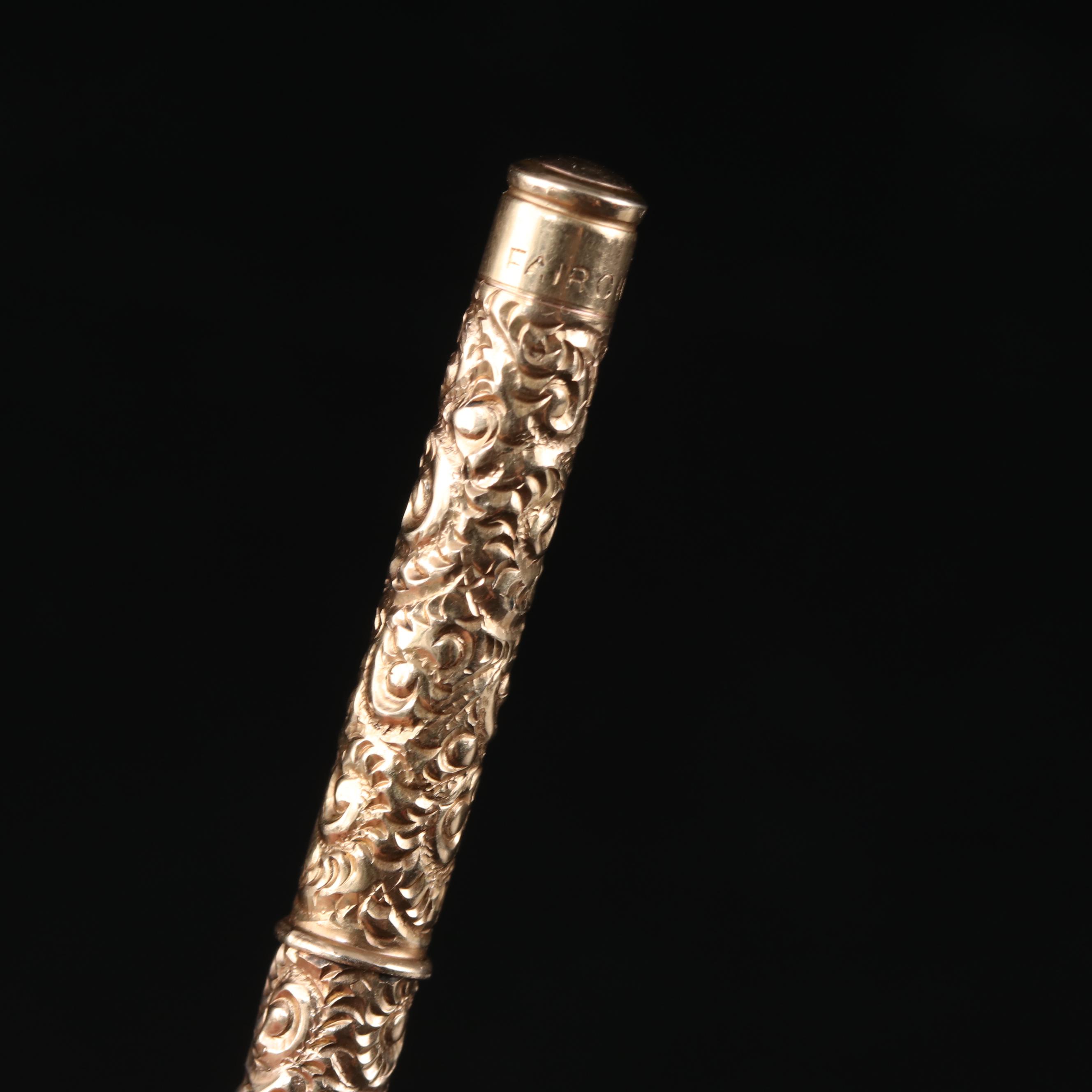 Late Victorian Fairchild Gold Tone Chased Metal Retractable Toothpick
