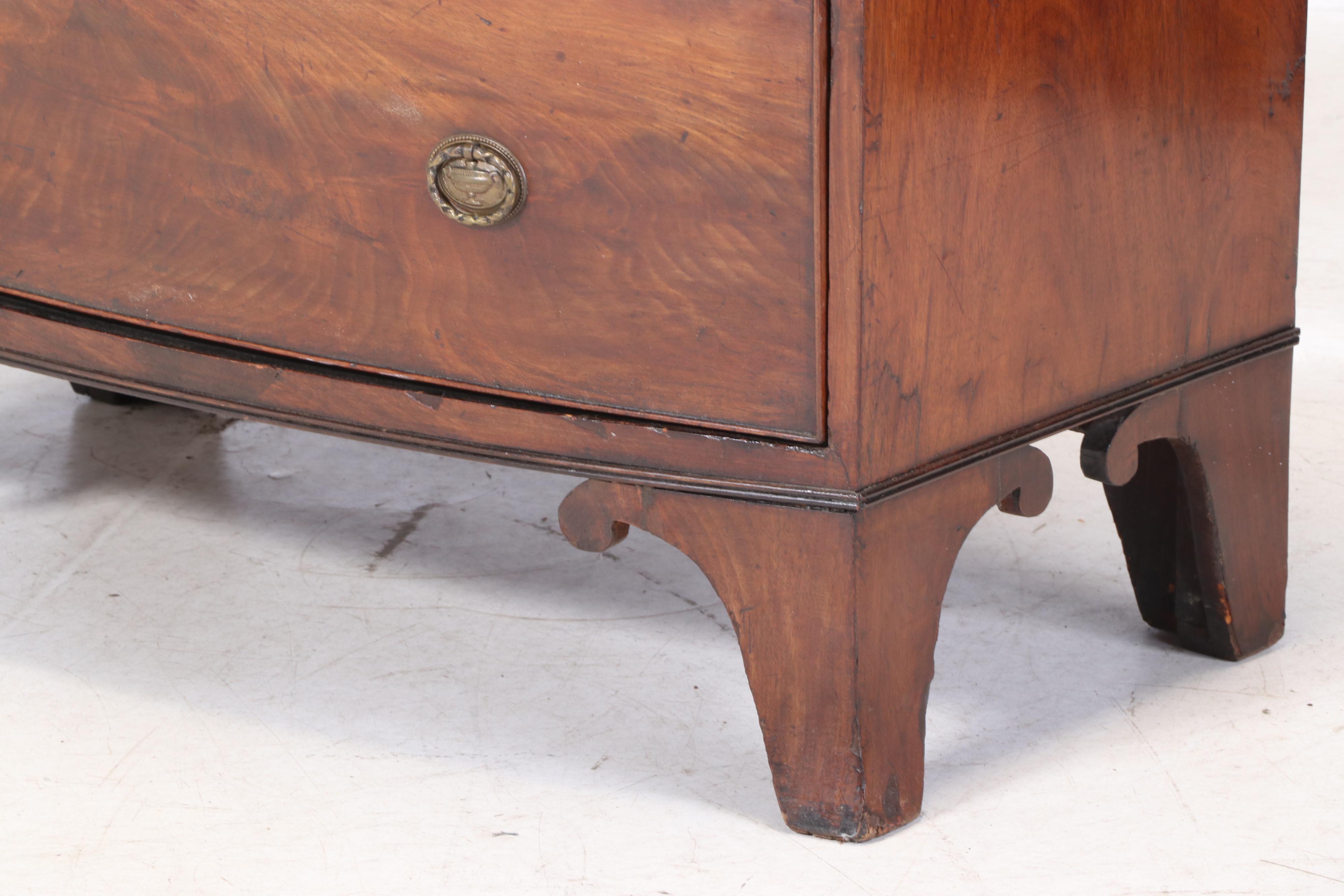 George III Flame Mahogany and Crossbanded Four-Drawer Bowfront Chest, circa 1800