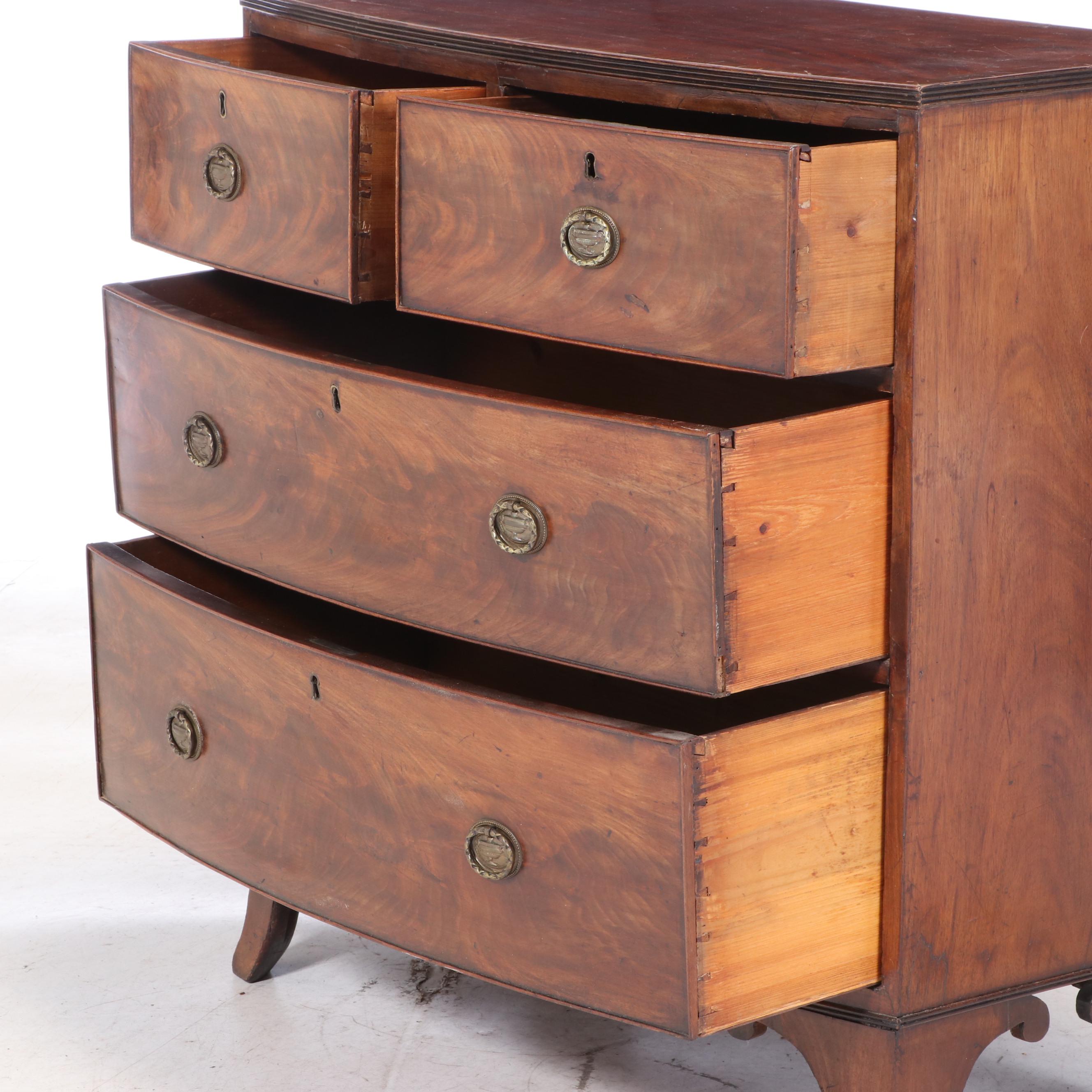 George III Flame Mahogany and Crossbanded Four-Drawer Bowfront Chest, circa 1800