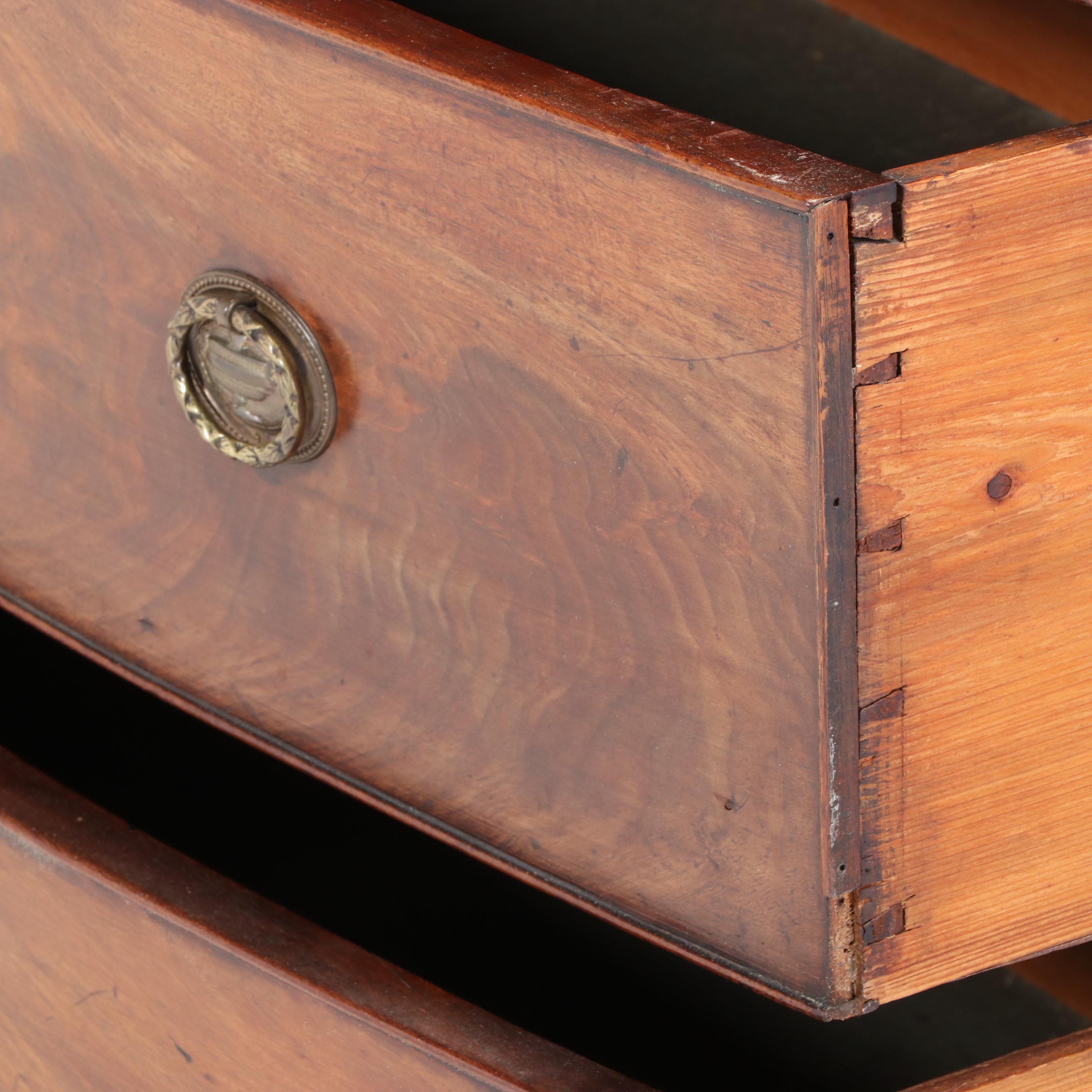 George III Flame Mahogany and Crossbanded Four-Drawer Bowfront Chest, circa 1800