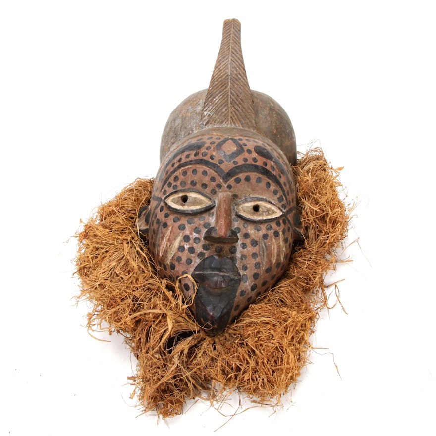 Yoruba Polychrome Helmet Mask with Raffia, Nigeria