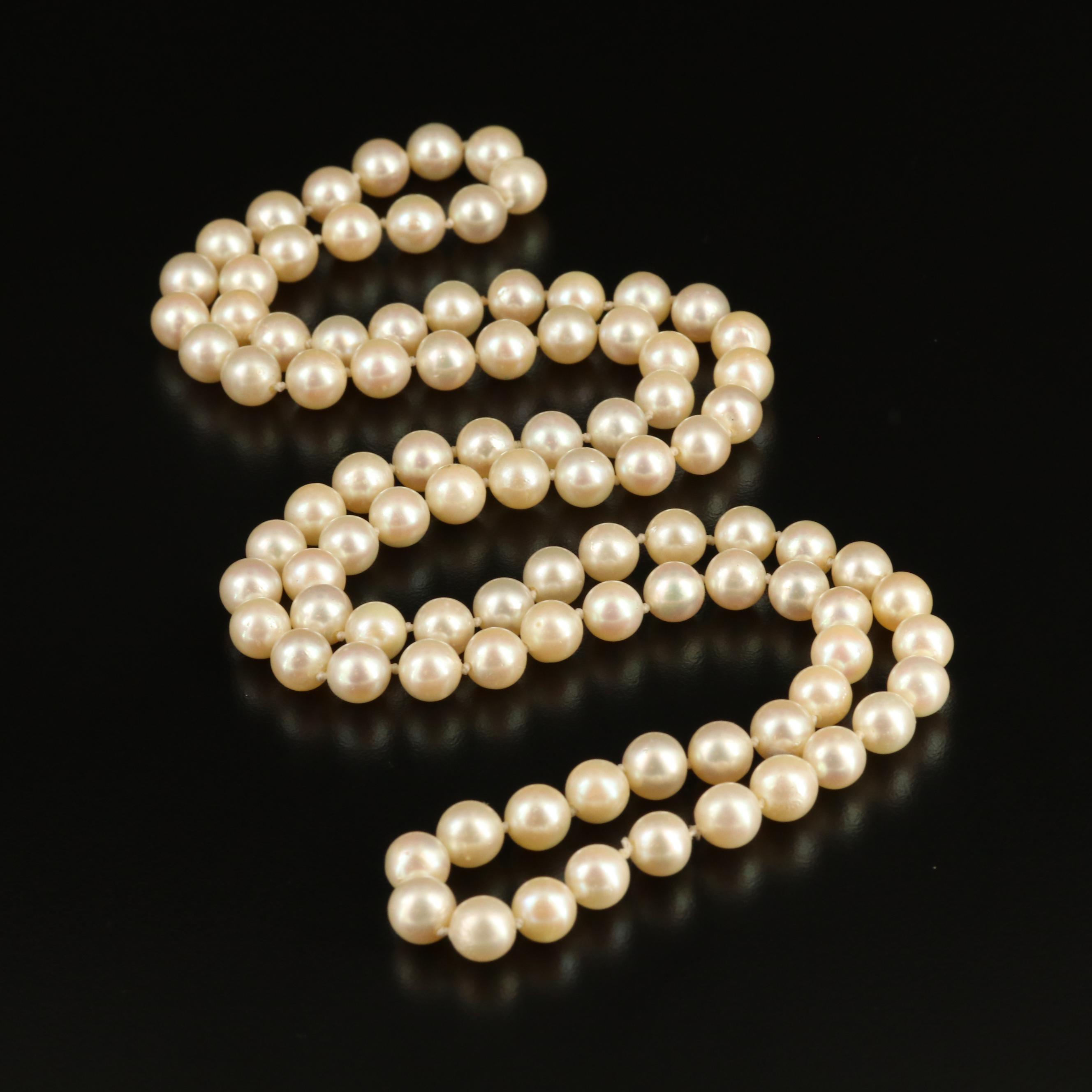 Endless Knotted Pearl Necklace