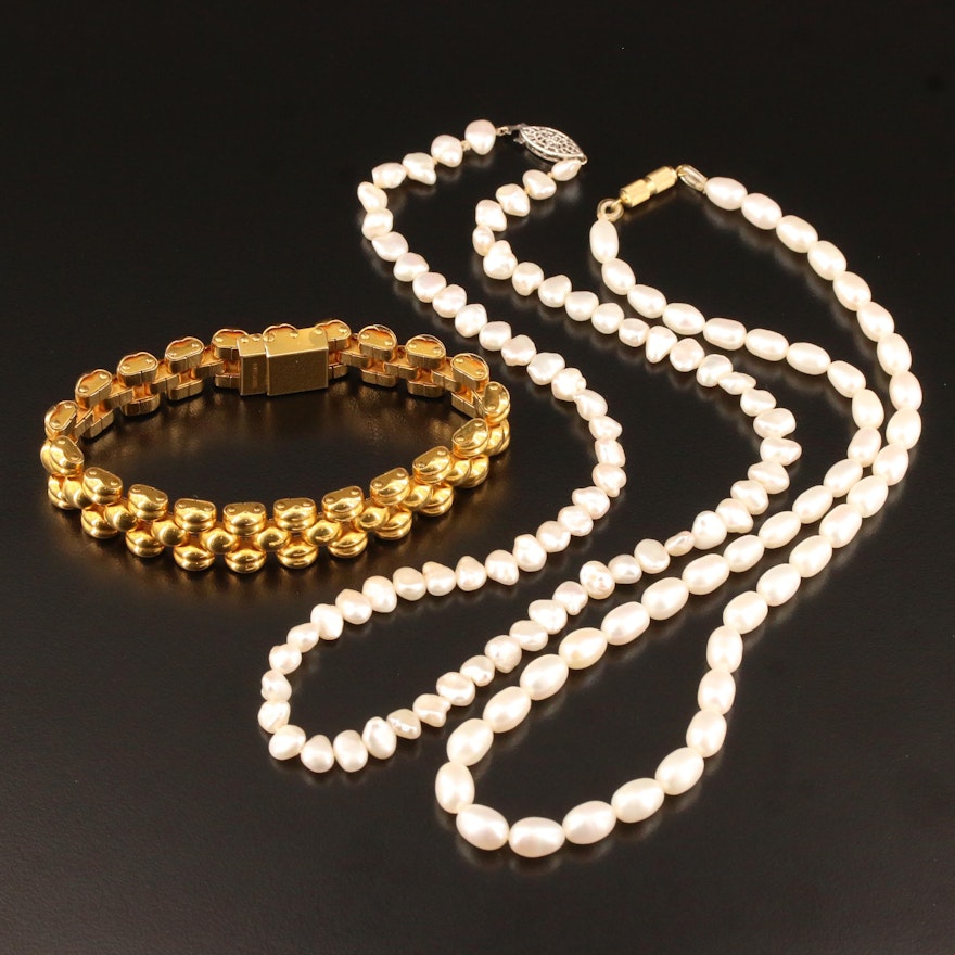 Oval and Baroque Pearl Necklaces with a Swiss Panther Link Bracelet