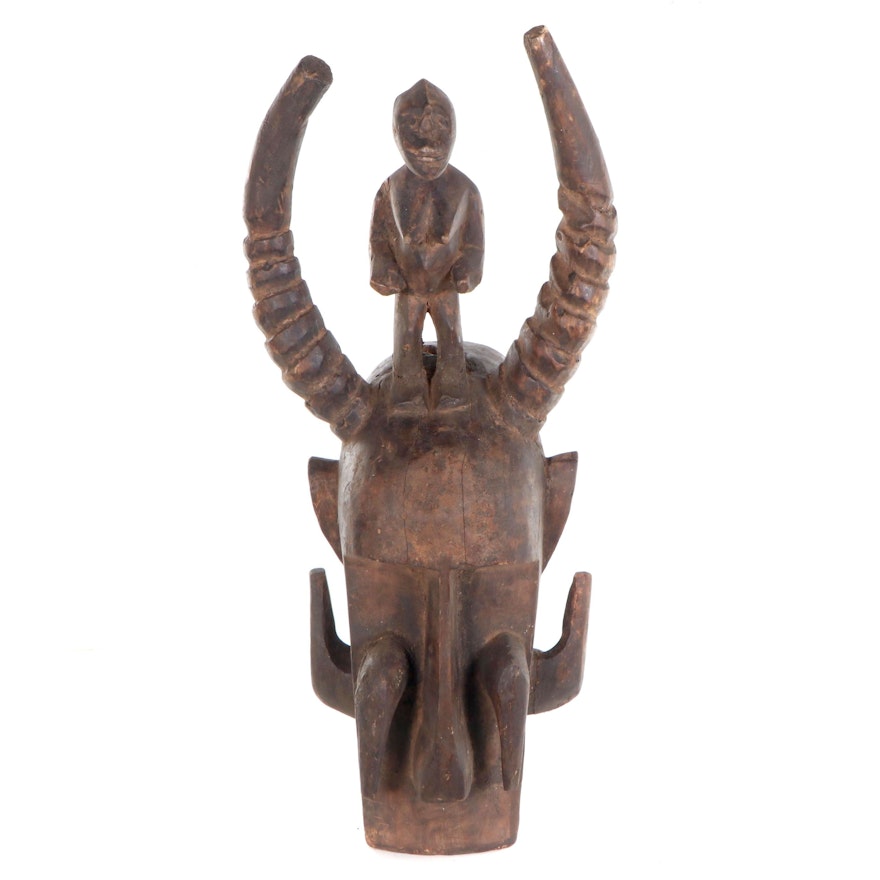 Senufo Inspired Helmet Mask with Figure Atop, West Africa