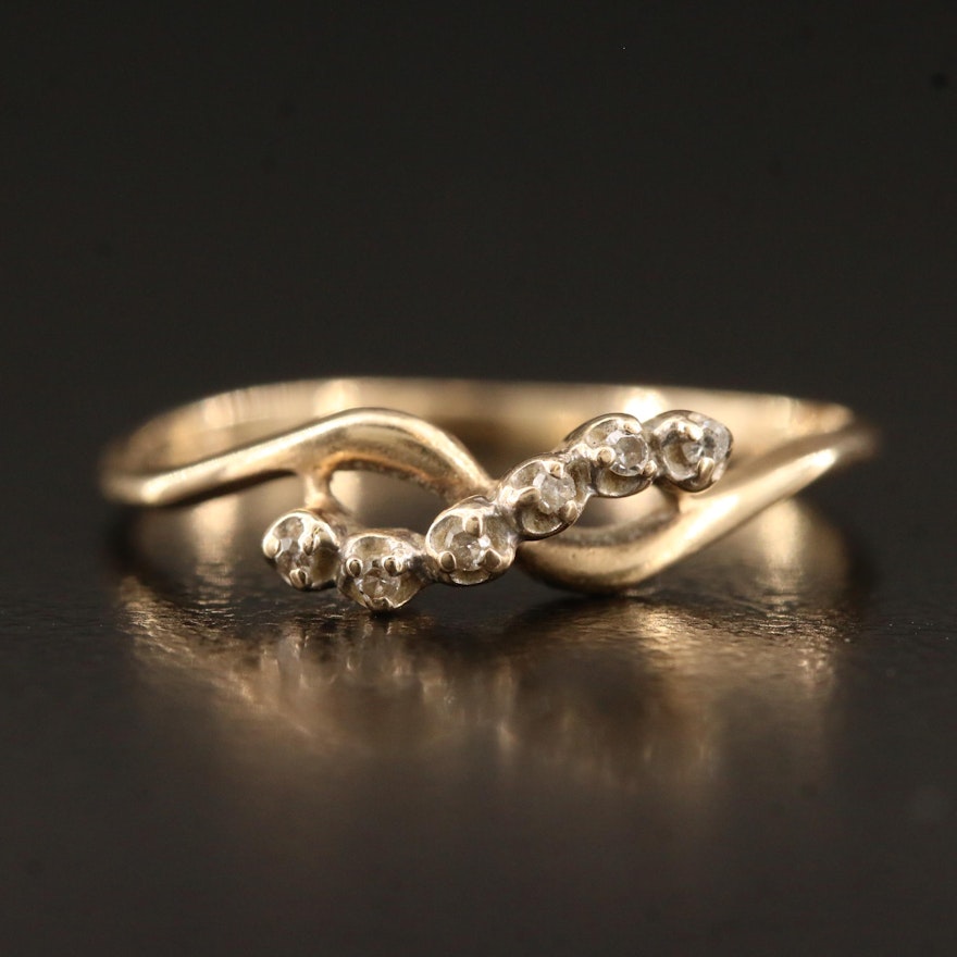 10K Diamond Ring Featuring Crossover Design