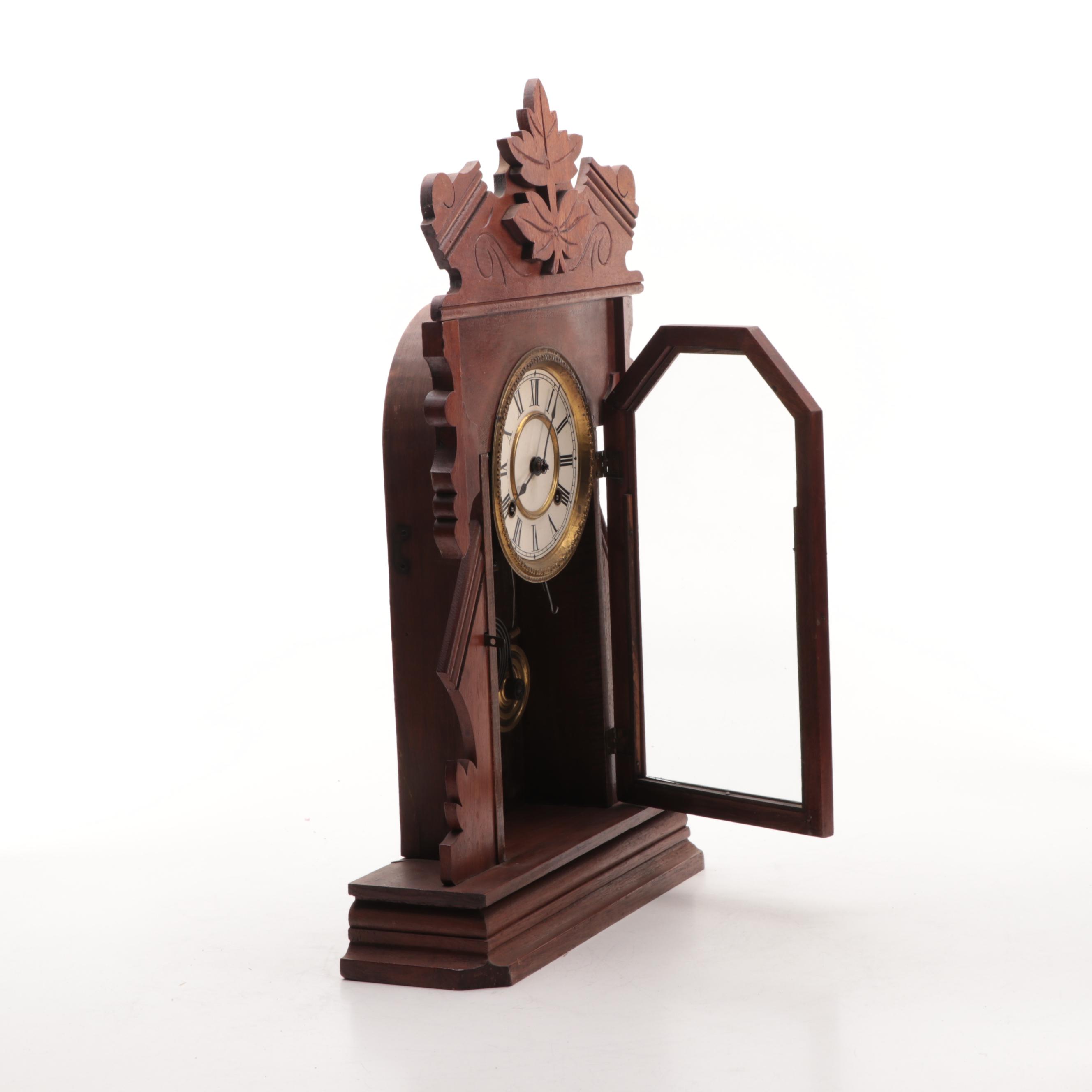 New Haven Clock Co Walnut Gingerbread Clock, Late 19th to Early 20th Century
