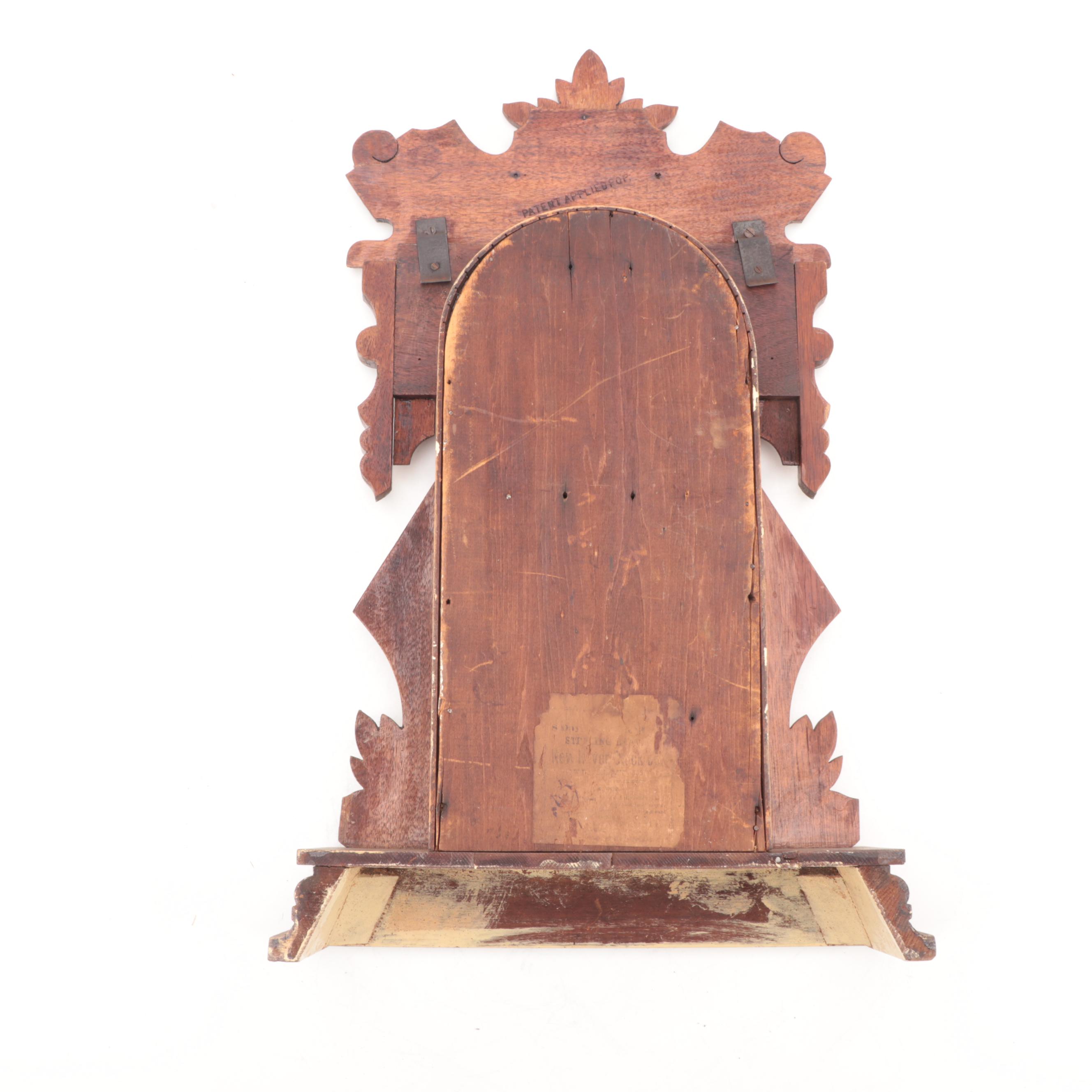 New Haven Clock Co Walnut Gingerbread Clock, Late 19th to Early 20th Century