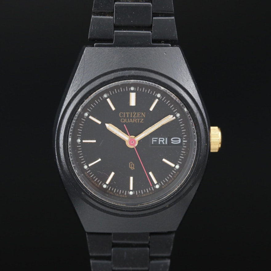 Citizen "CQ" Day-Date Black and Gold Tone Quartz Wristwatch