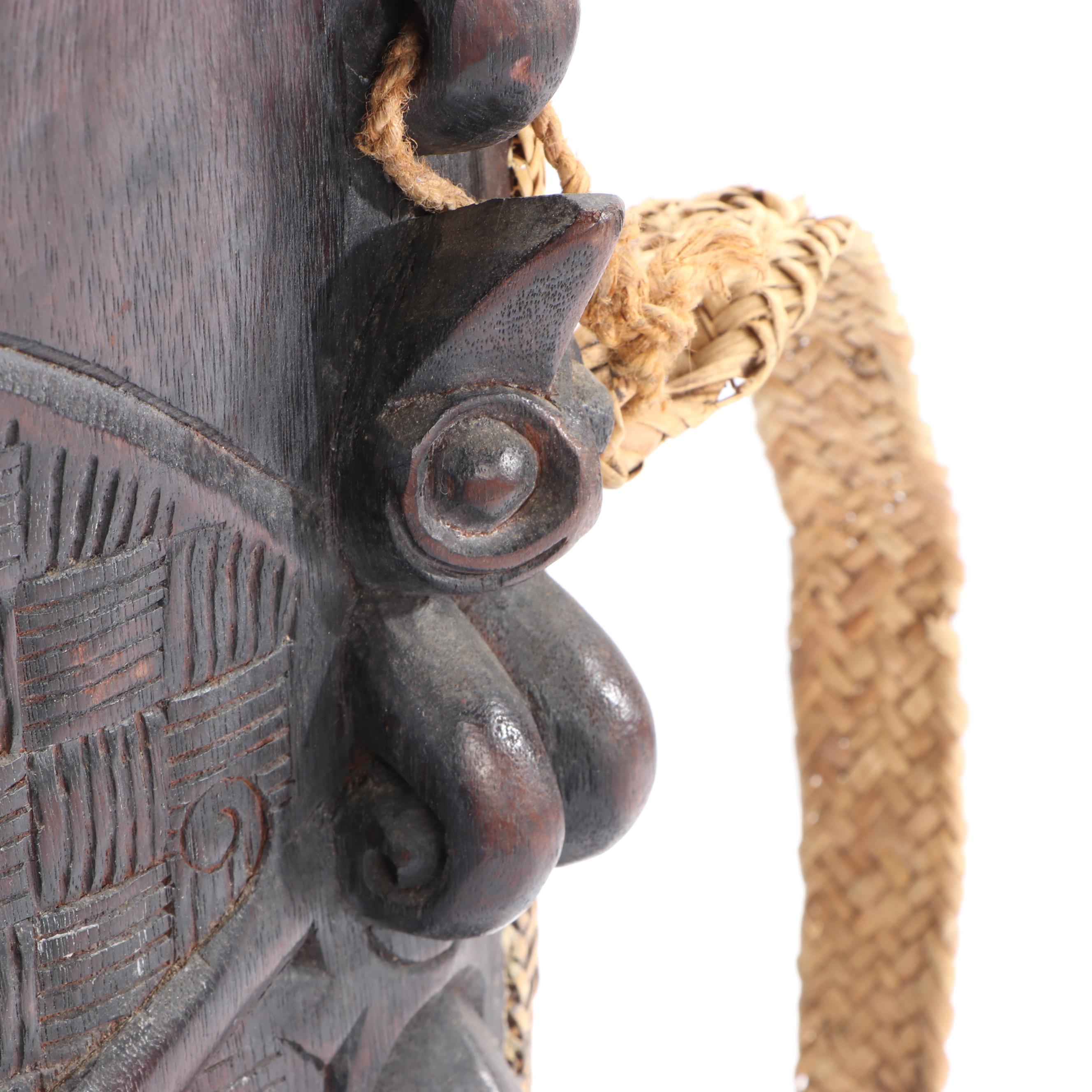 Kayan Baby Carrier with Depiction of Demon Face, Indonesia