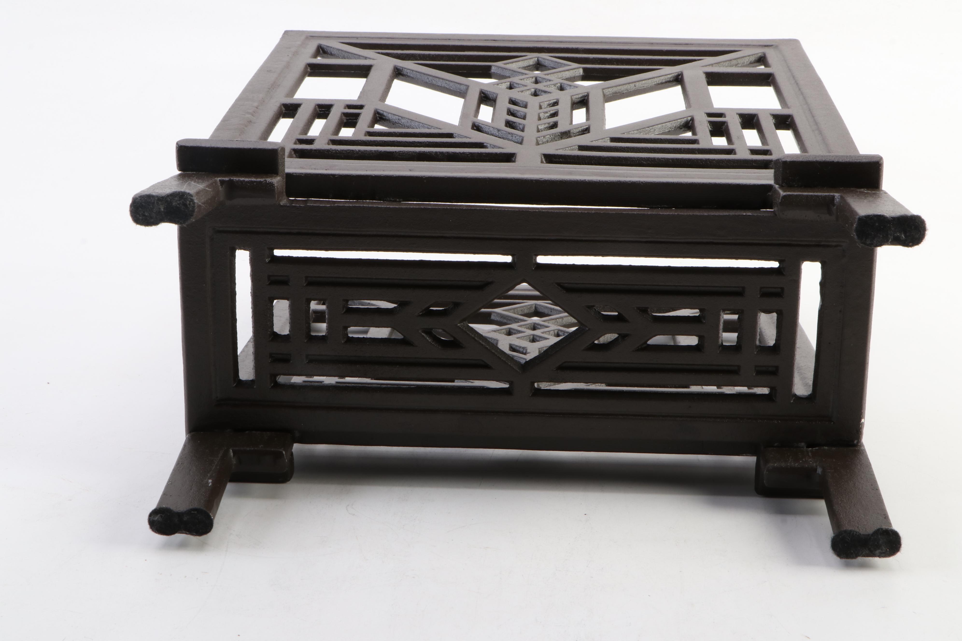 Frank Lloyd Wright "Geneva" Cast Metal Magazine Rack