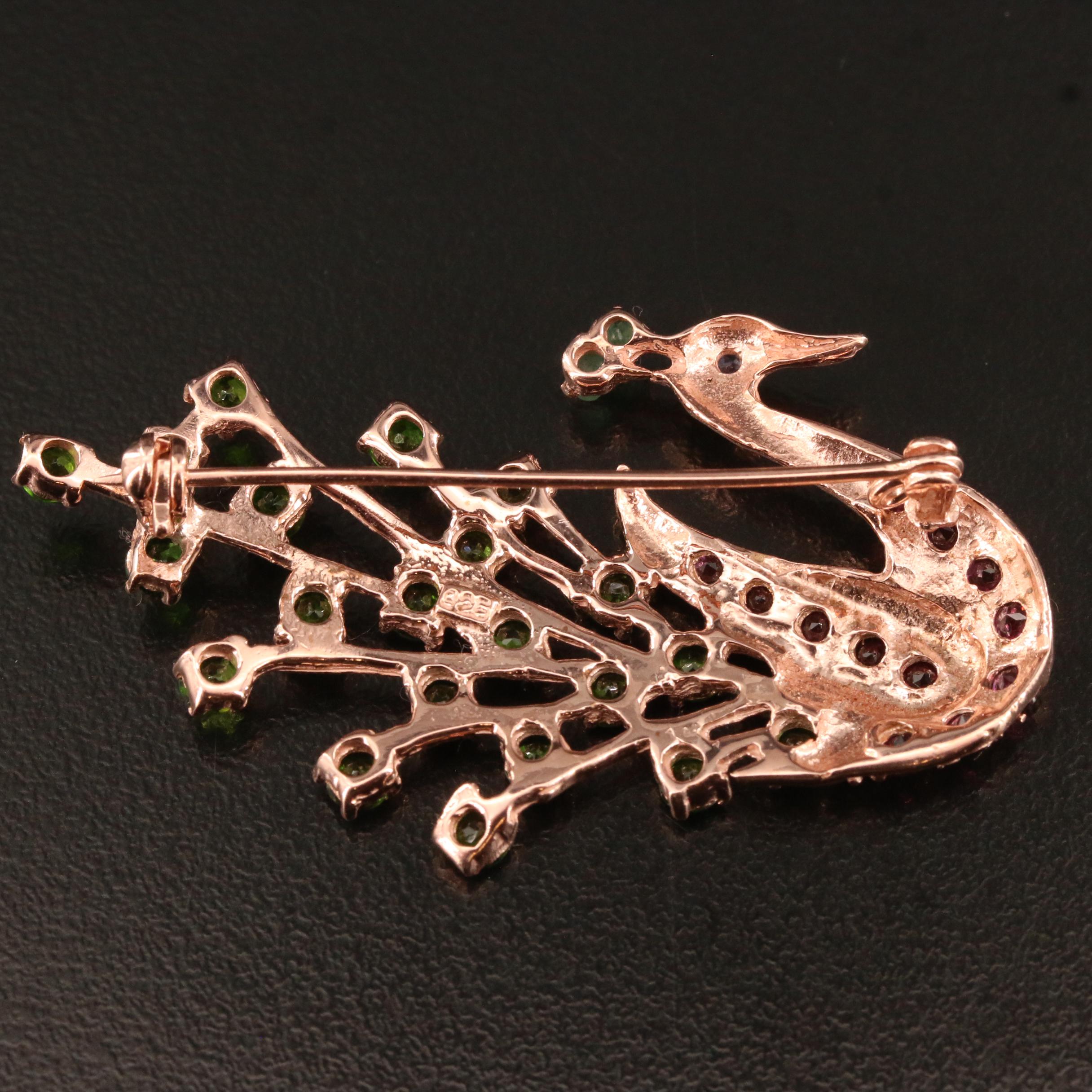 Sterling Silver Peacock Brooch Featuring Diopside, Emerald, Garnet and Tanzanite