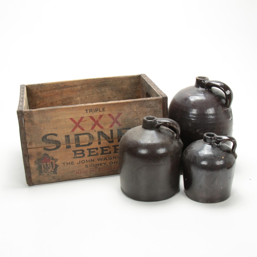 Brown Glazed Stoneware Whiskey Jugs in Wooden Beer Crate, Late 19th/Early 20th C