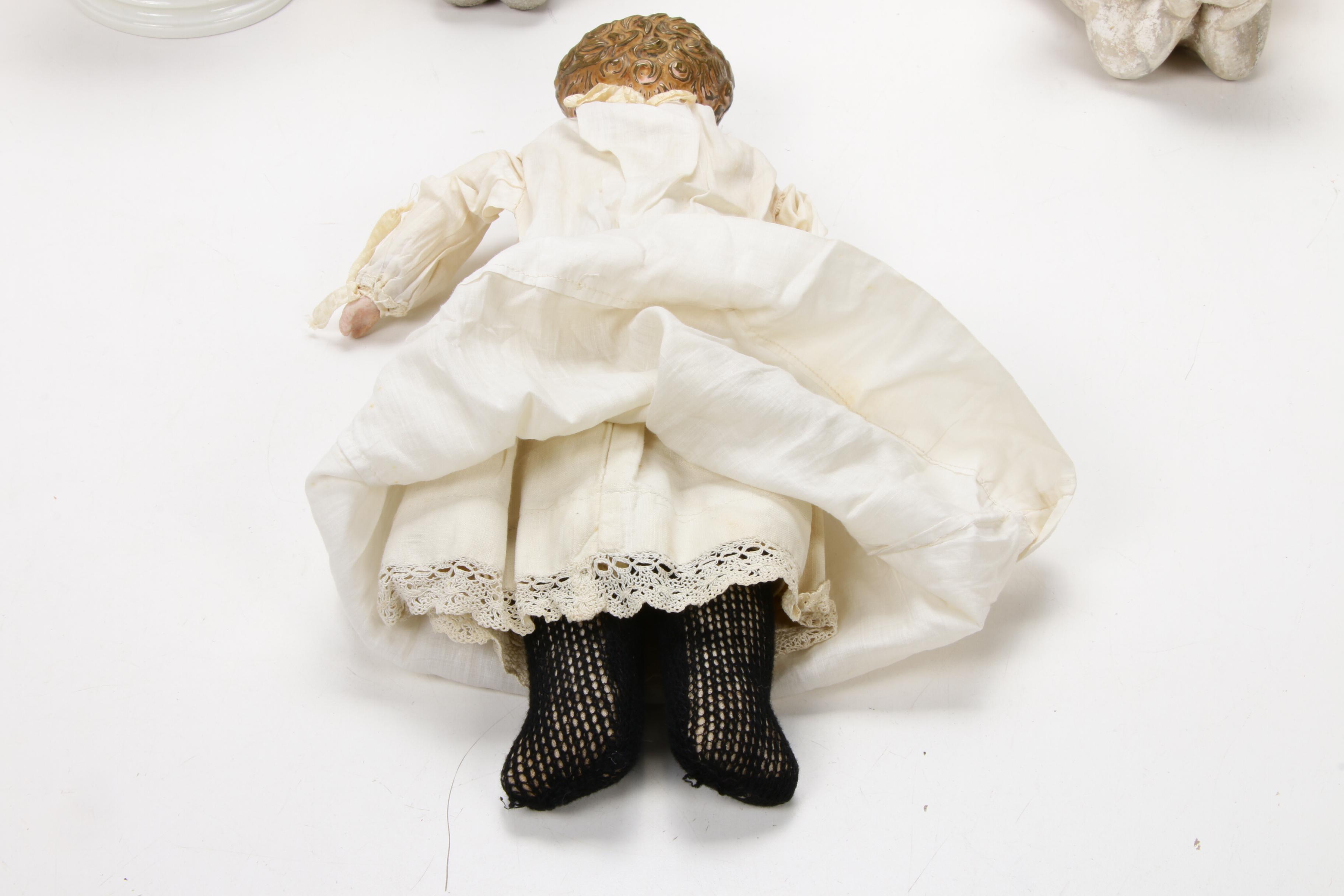 Painted Tin Head Antique Baby Doll with Angel and Child Decorations