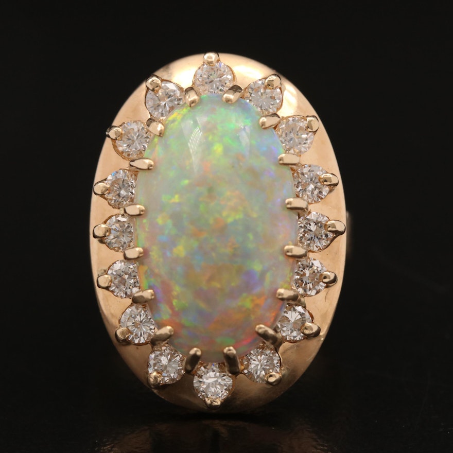 14K 7.39 CT Opal and 1.04 CTW Diamond Ring