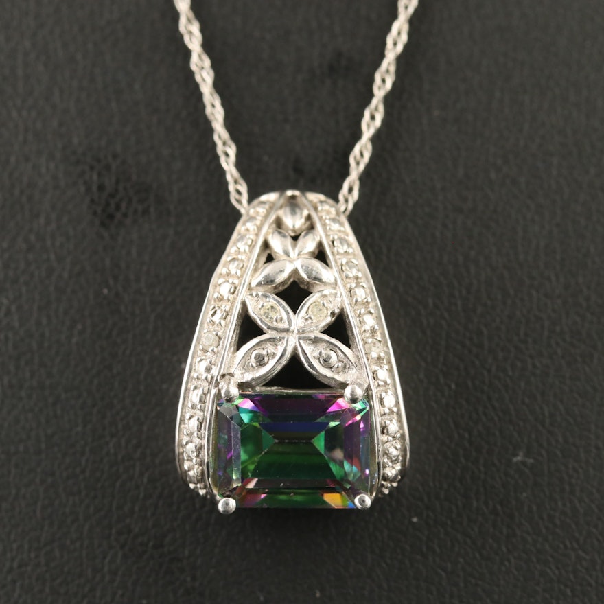 Sterling Silver Topaz Pendant with Diamond Accents