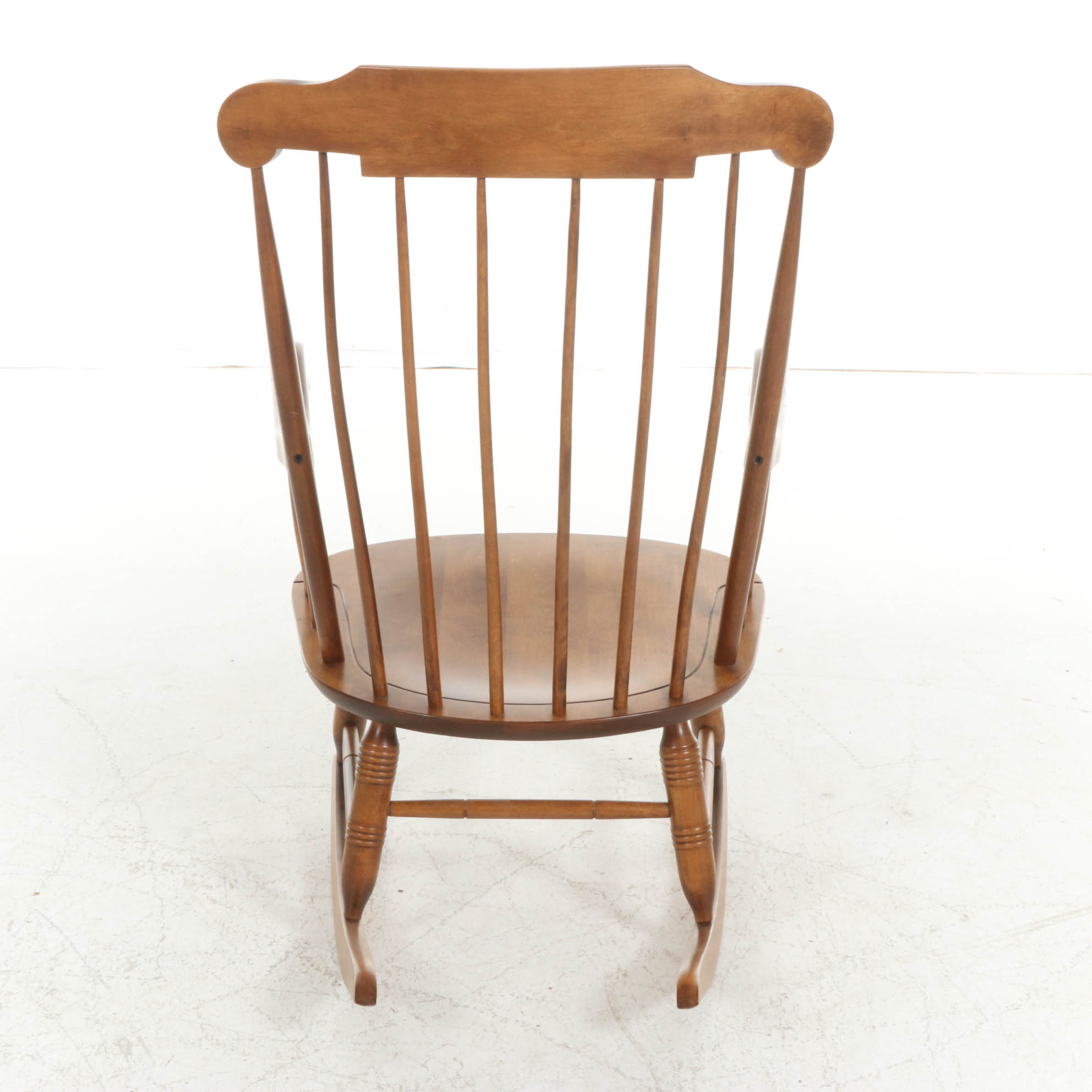 Nichols & Stone Co. New England Turned Maple Windsor Rocking Chair, 20th C.