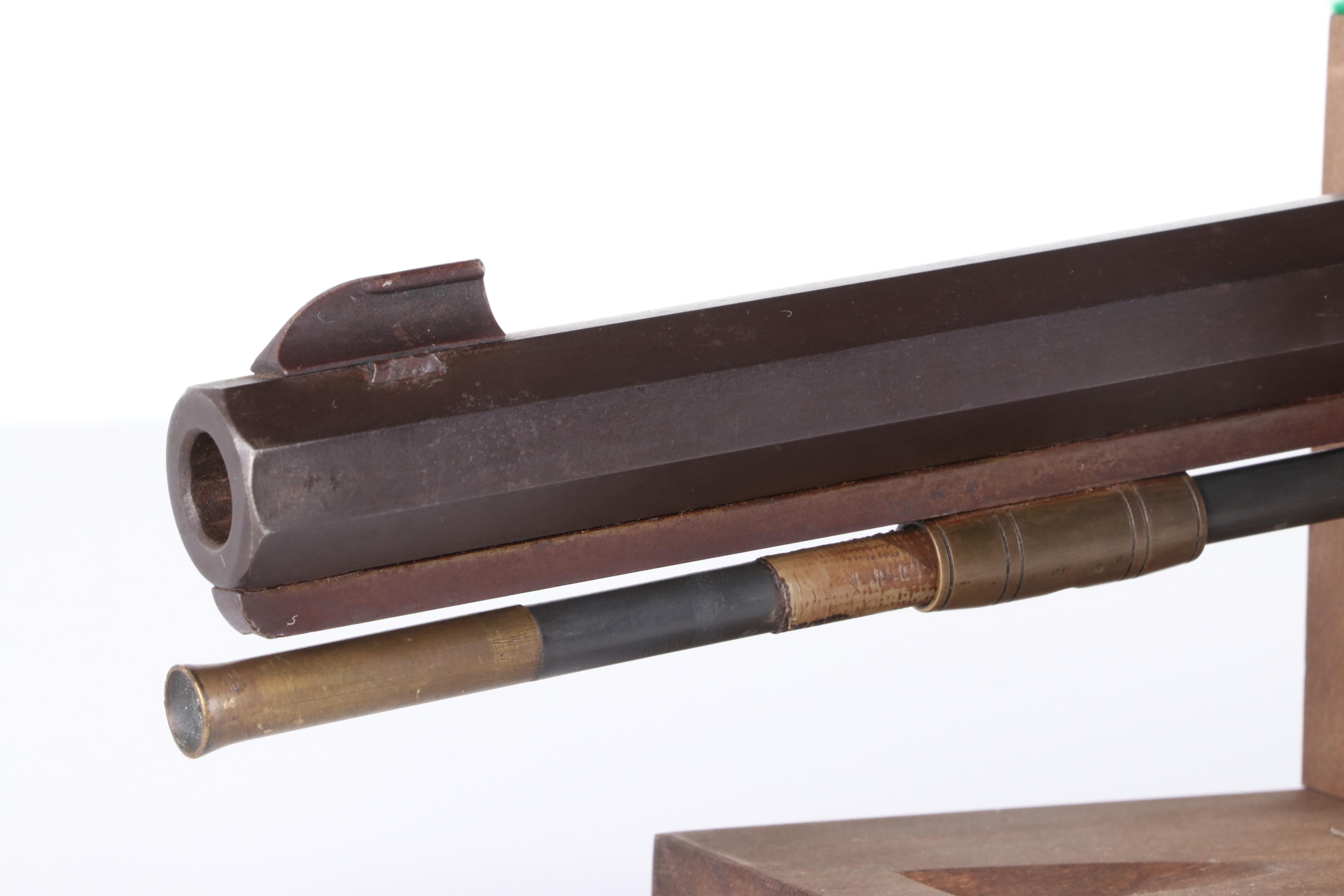 Thompson/Center Arms Reproduction 50 Cal Muzzleloader with Ramrod, Late 20th C