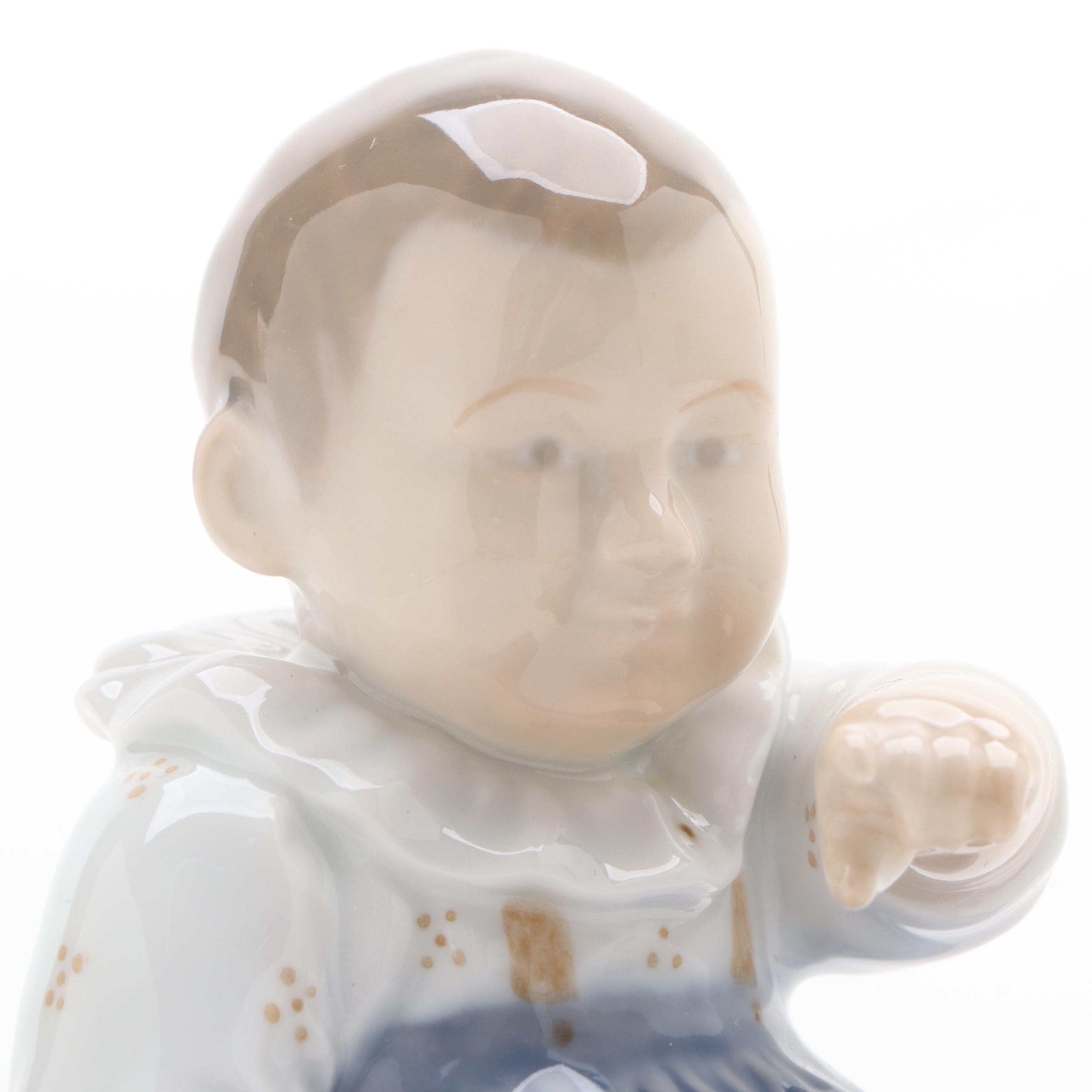 Royal Copenhagen "Baby Crawling" and "Baby Pointing" Porcelain Figurines