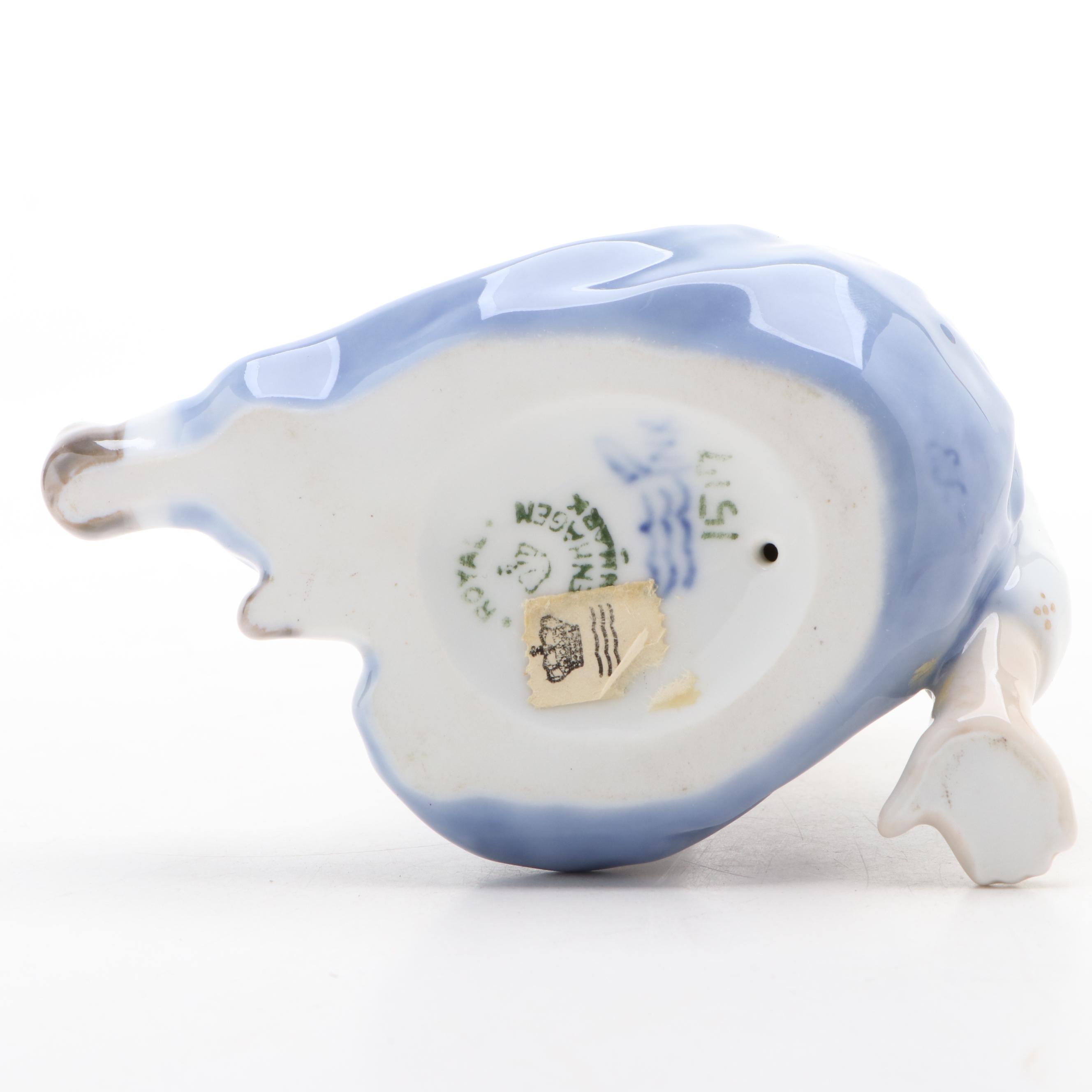 Royal Copenhagen "Baby Crawling" and "Baby Pointing" Porcelain Figurines