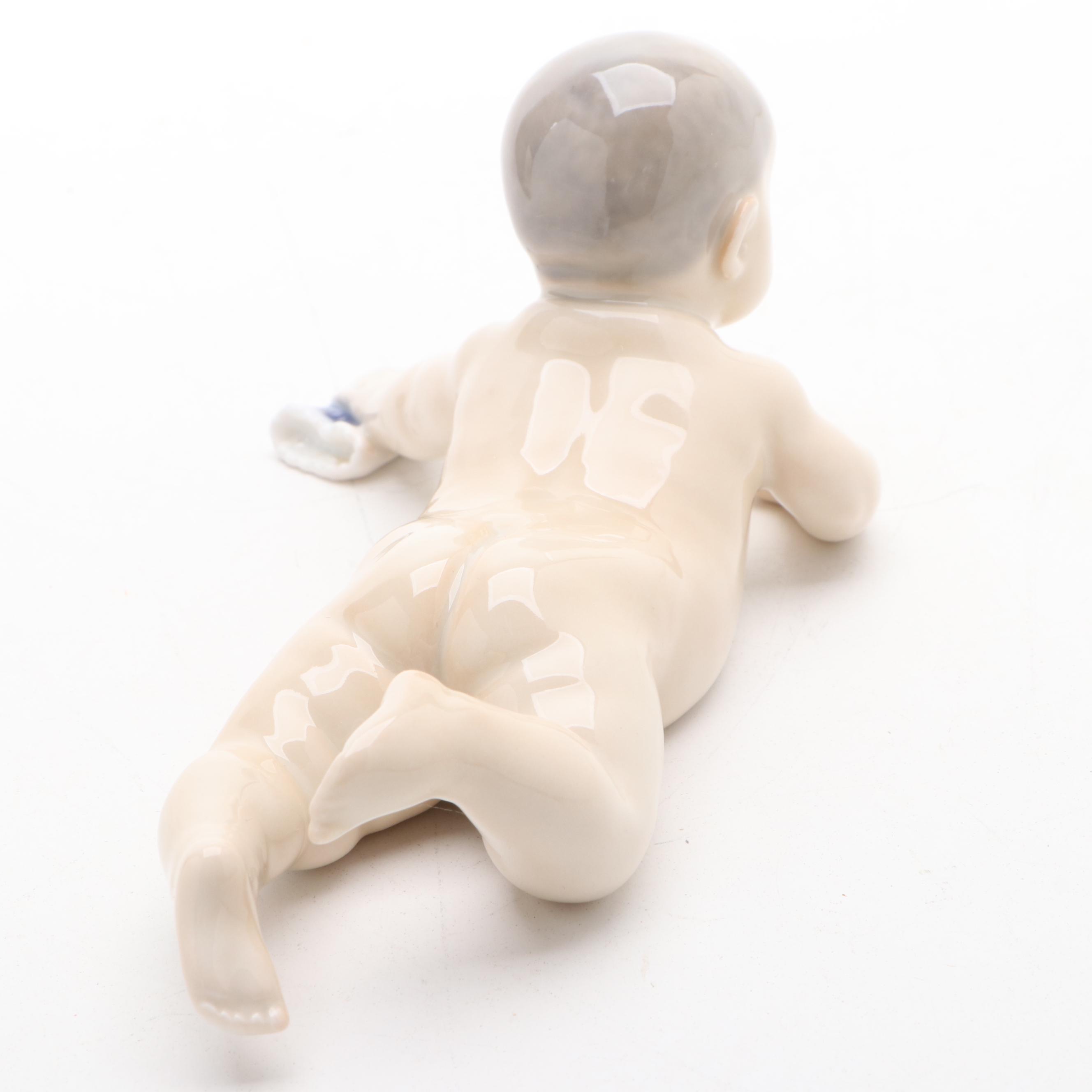Royal Copenhagen "Baby Crawling" and "Baby Pointing" Porcelain Figurines