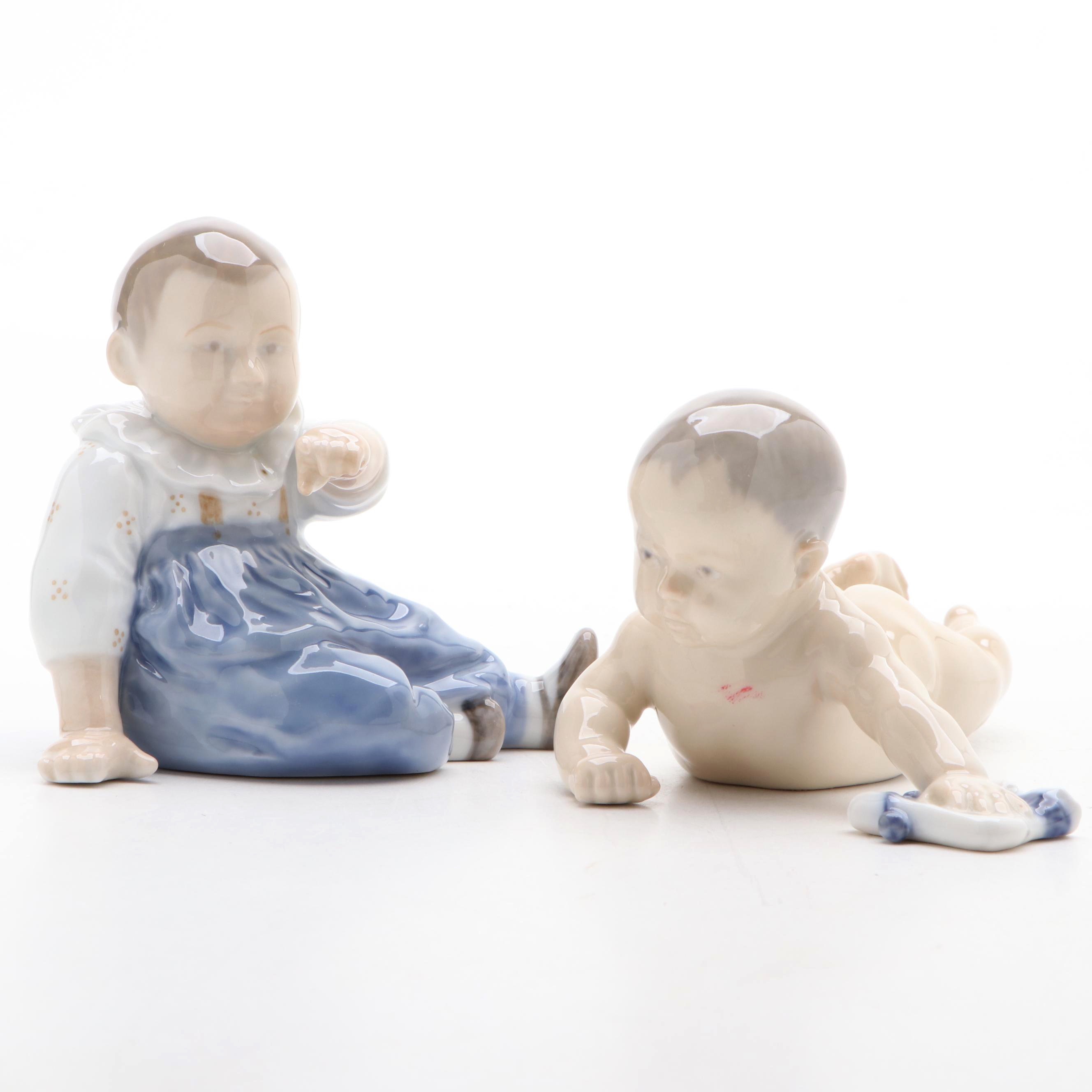 Royal Copenhagen "Baby Crawling" and "Baby Pointing" Porcelain Figurines