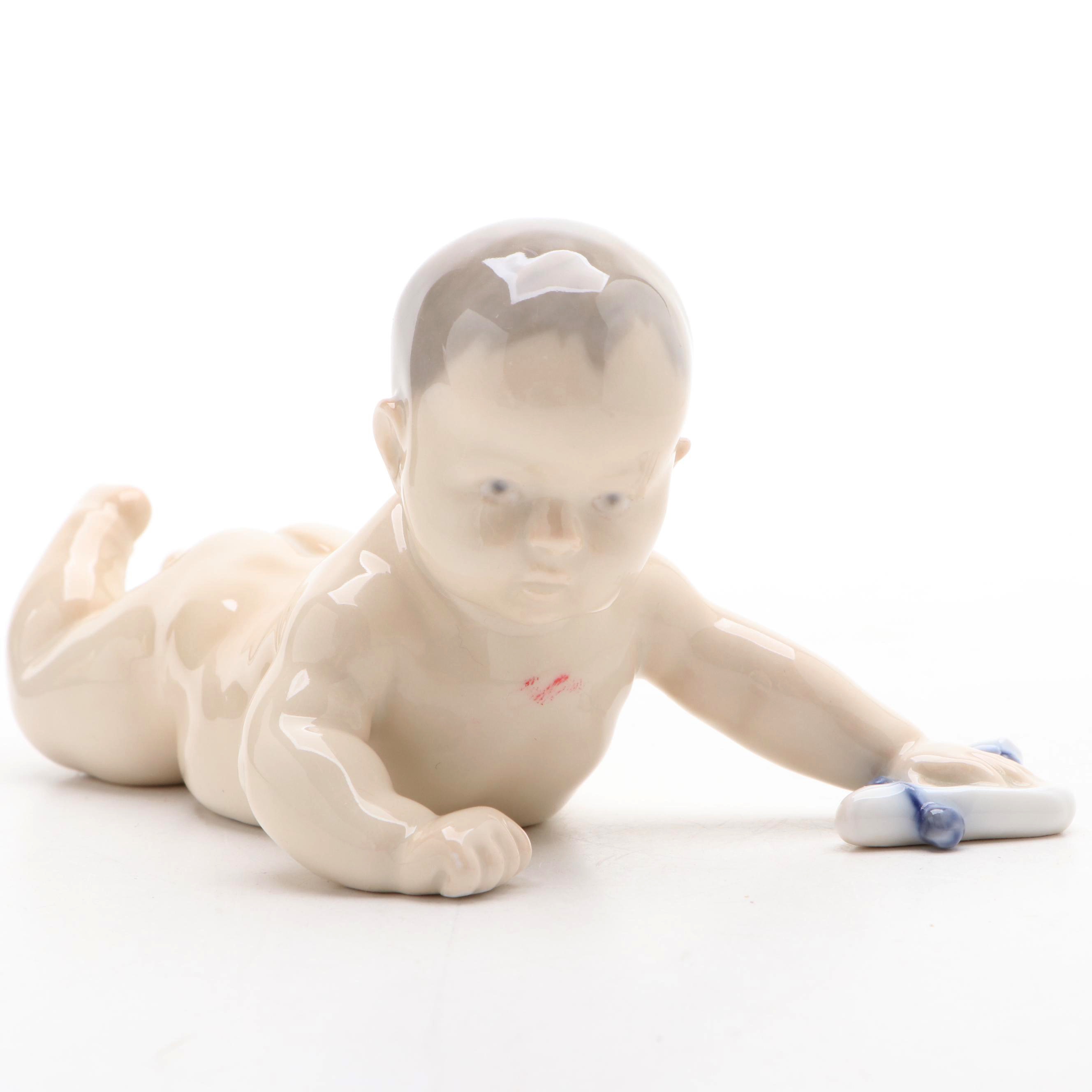 Royal Copenhagen "Baby Crawling" and "Baby Pointing" Porcelain Figurines
