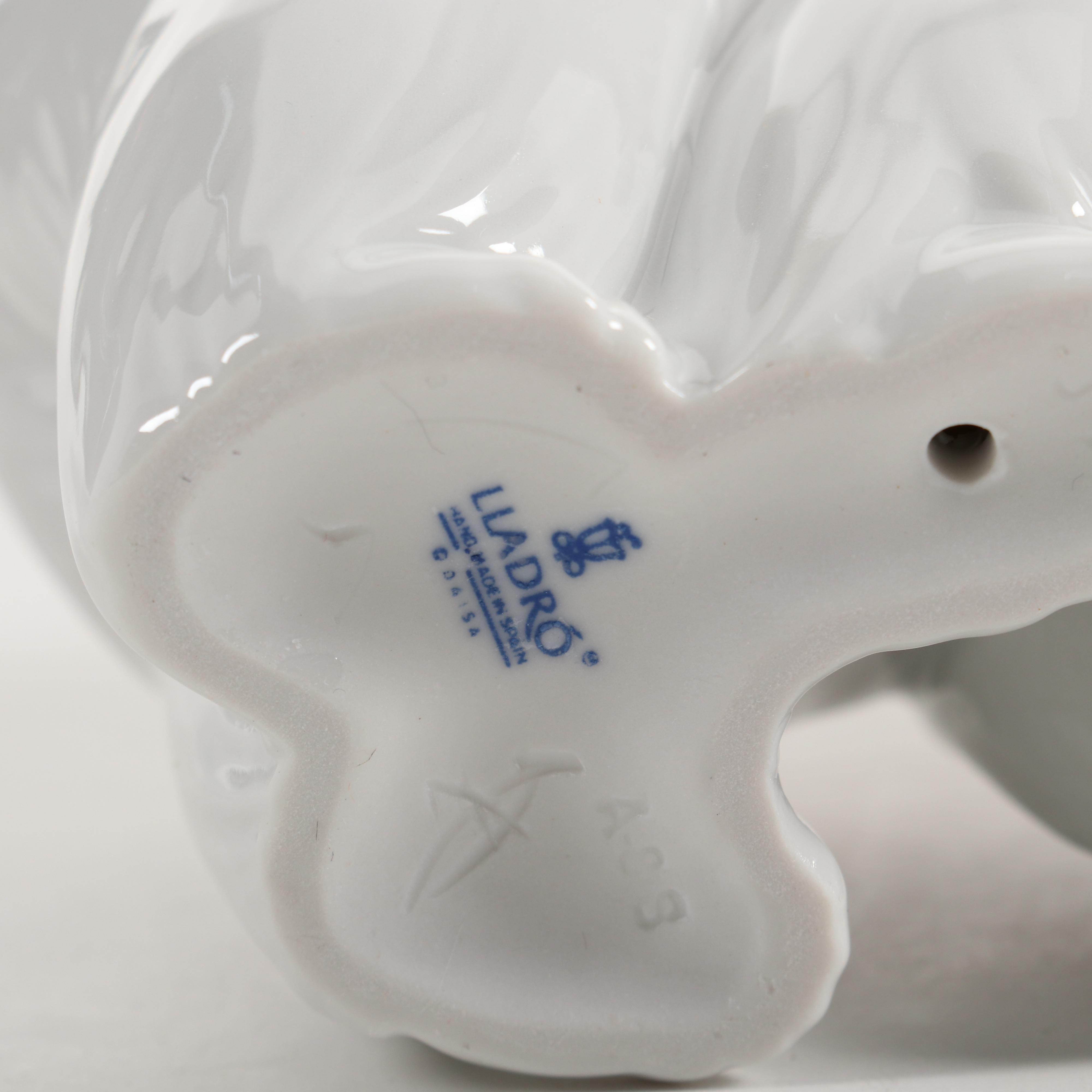 Lladró "Attentive Polar Bear" and "Resting Polar Bear" Porcelain Figurines