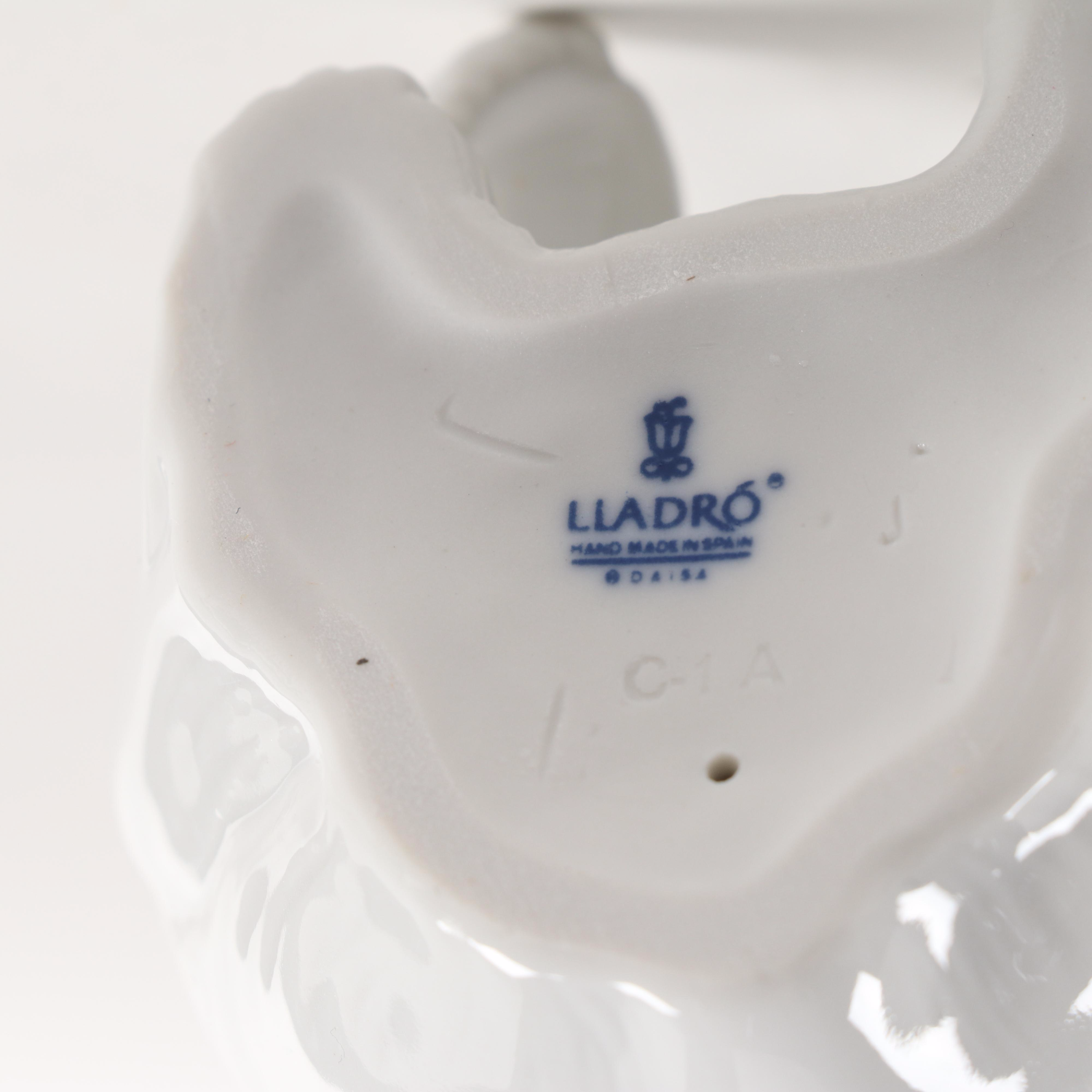 Lladró "Attentive Polar Bear" and "Resting Polar Bear" Porcelain Figurines