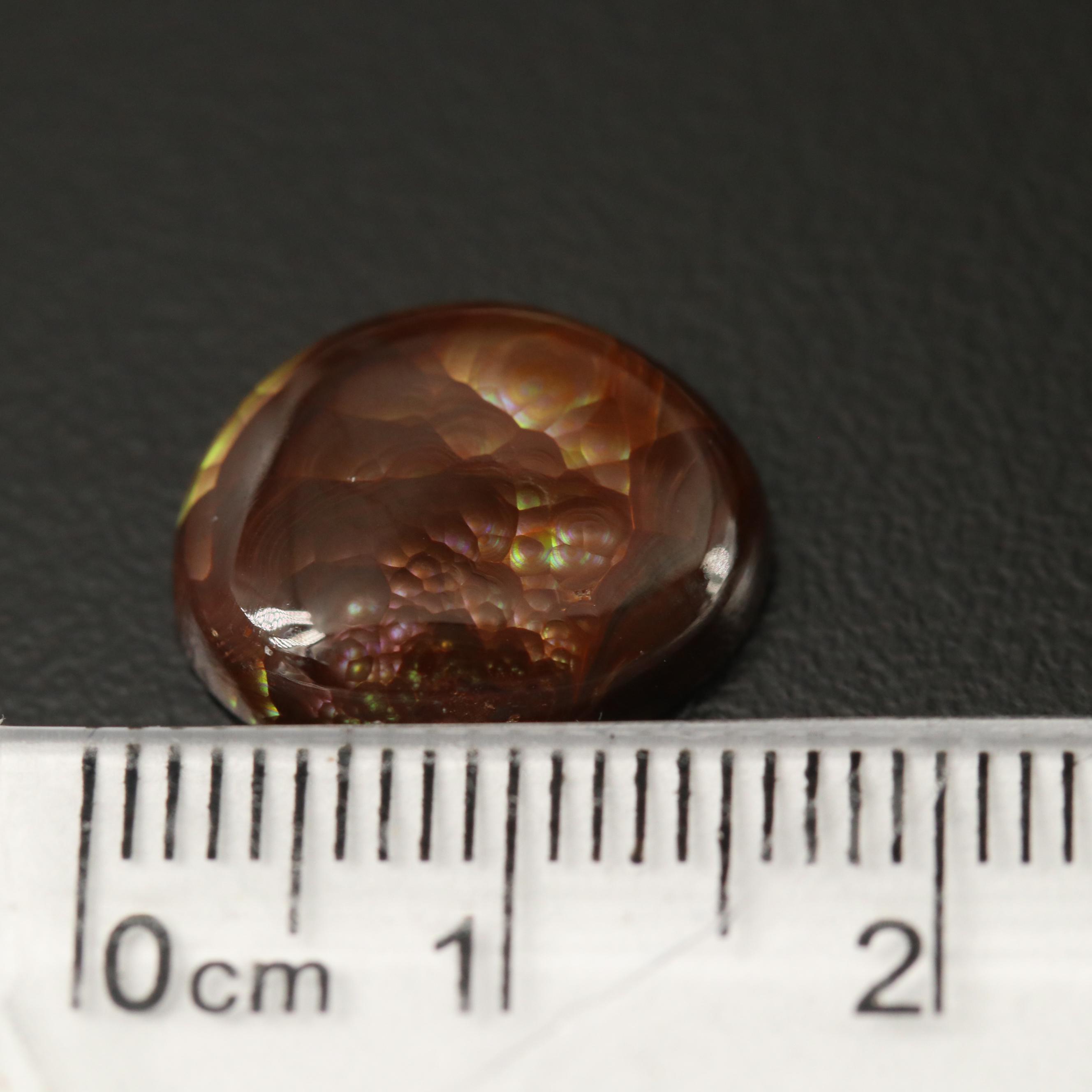 Loose Fire Agate Selection Featuring Oval Cabochon Shapes