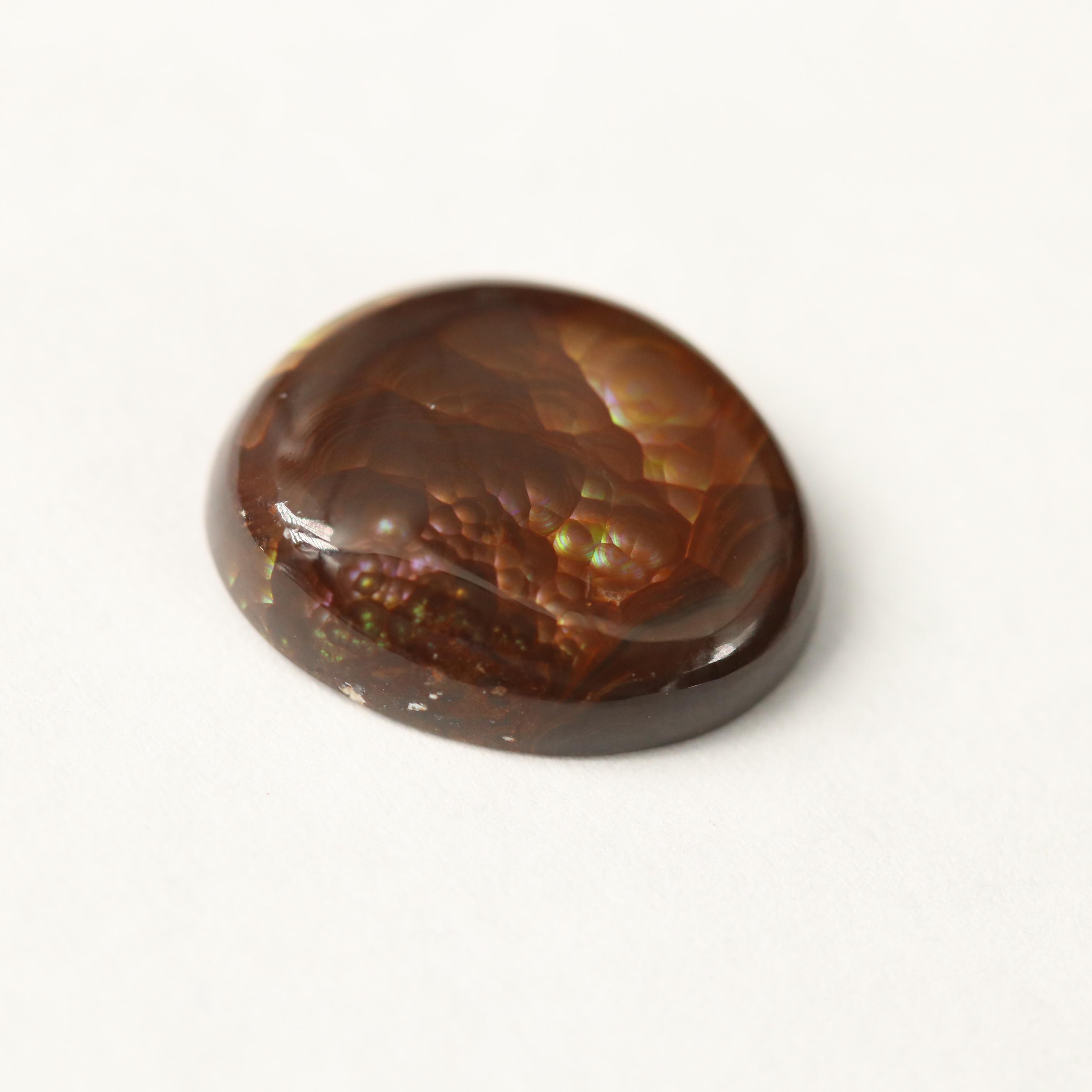 Loose Fire Agate Selection Featuring Oval Cabochon Shapes