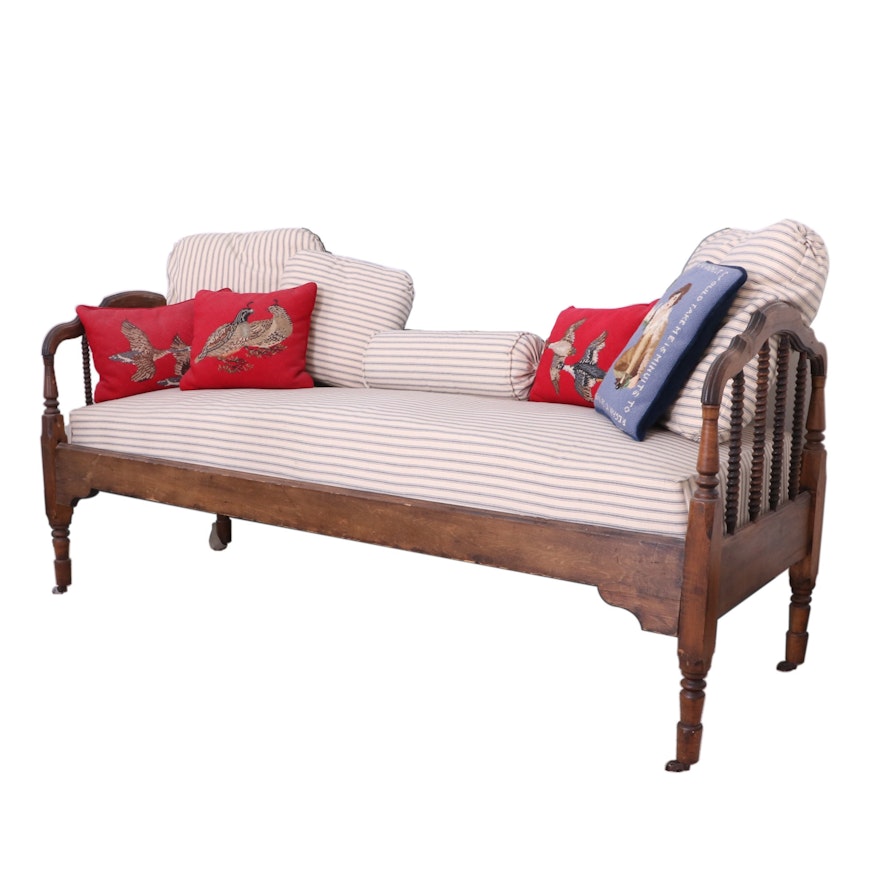Victorian Spindle Daybed with Ticking Covered Cushions and Needlepoint Pillows