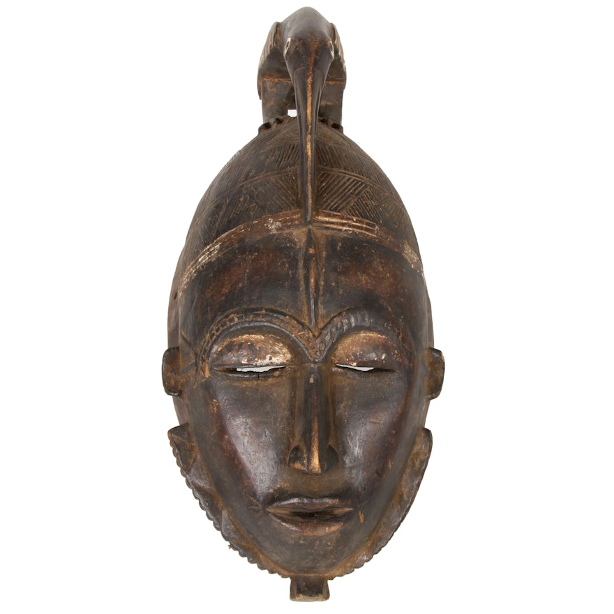 Guro Style Carved Wood Mask with Hornbill Motif, Côte d'Ivoire