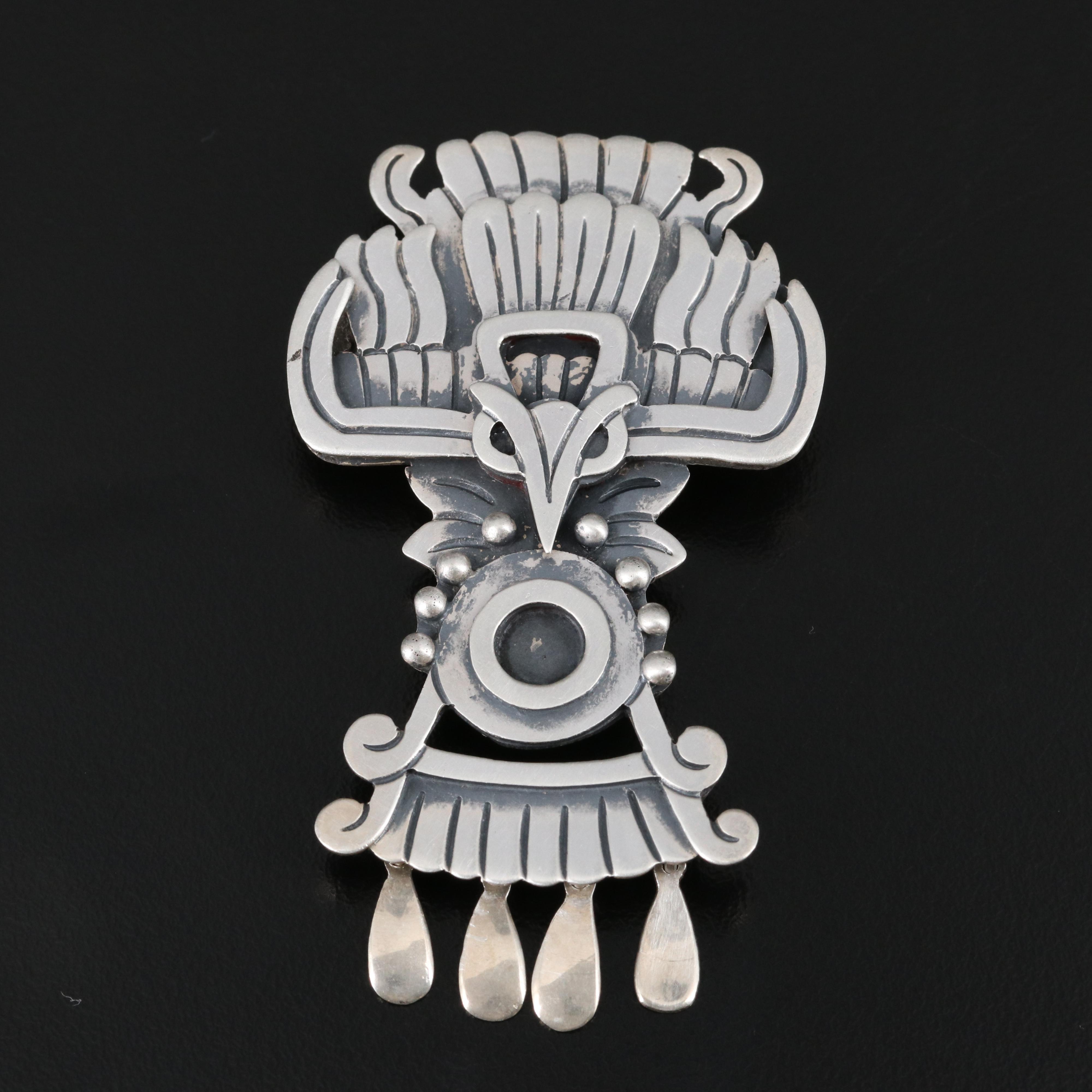 Modern Brooches Featuring Glass