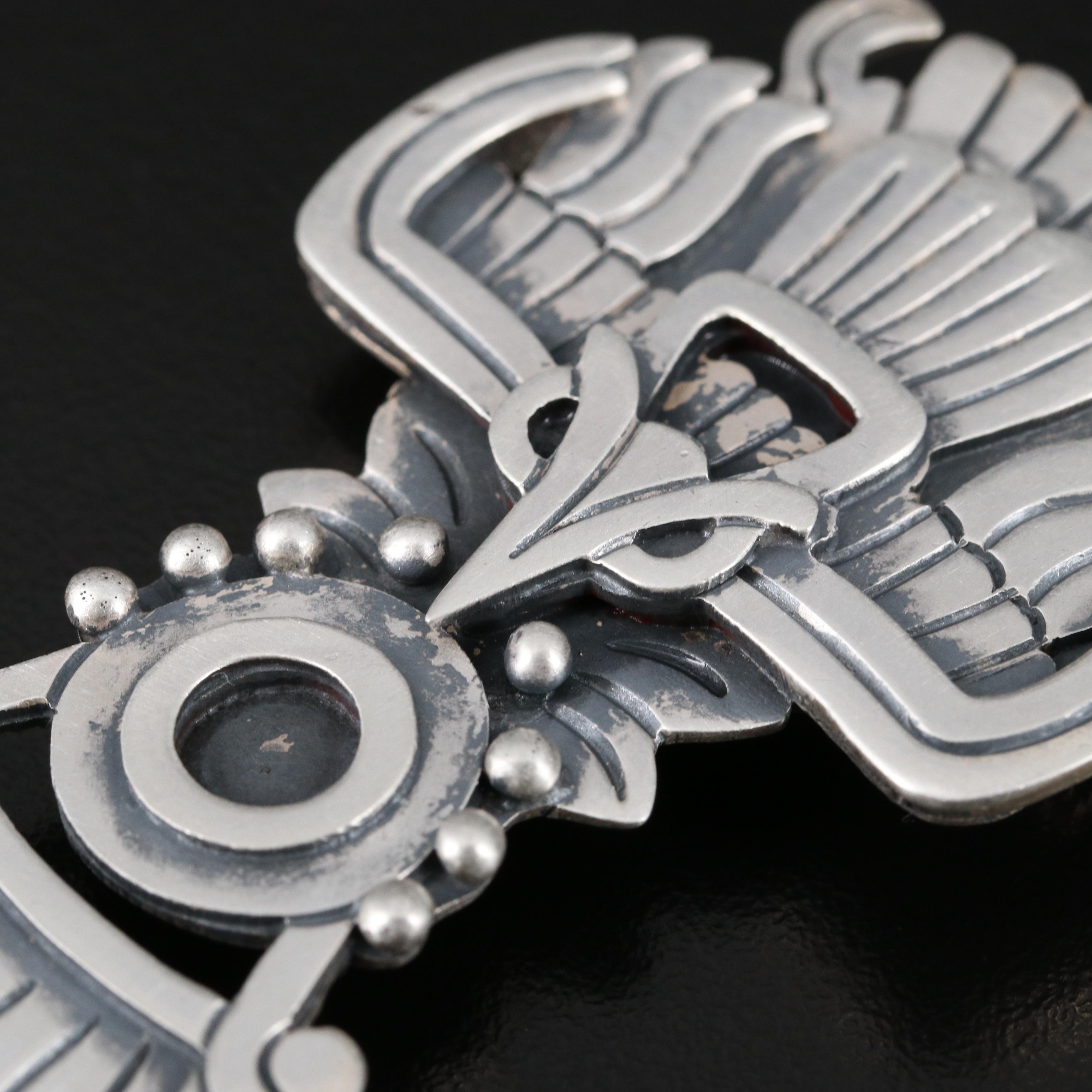 Modern Brooches Featuring Glass