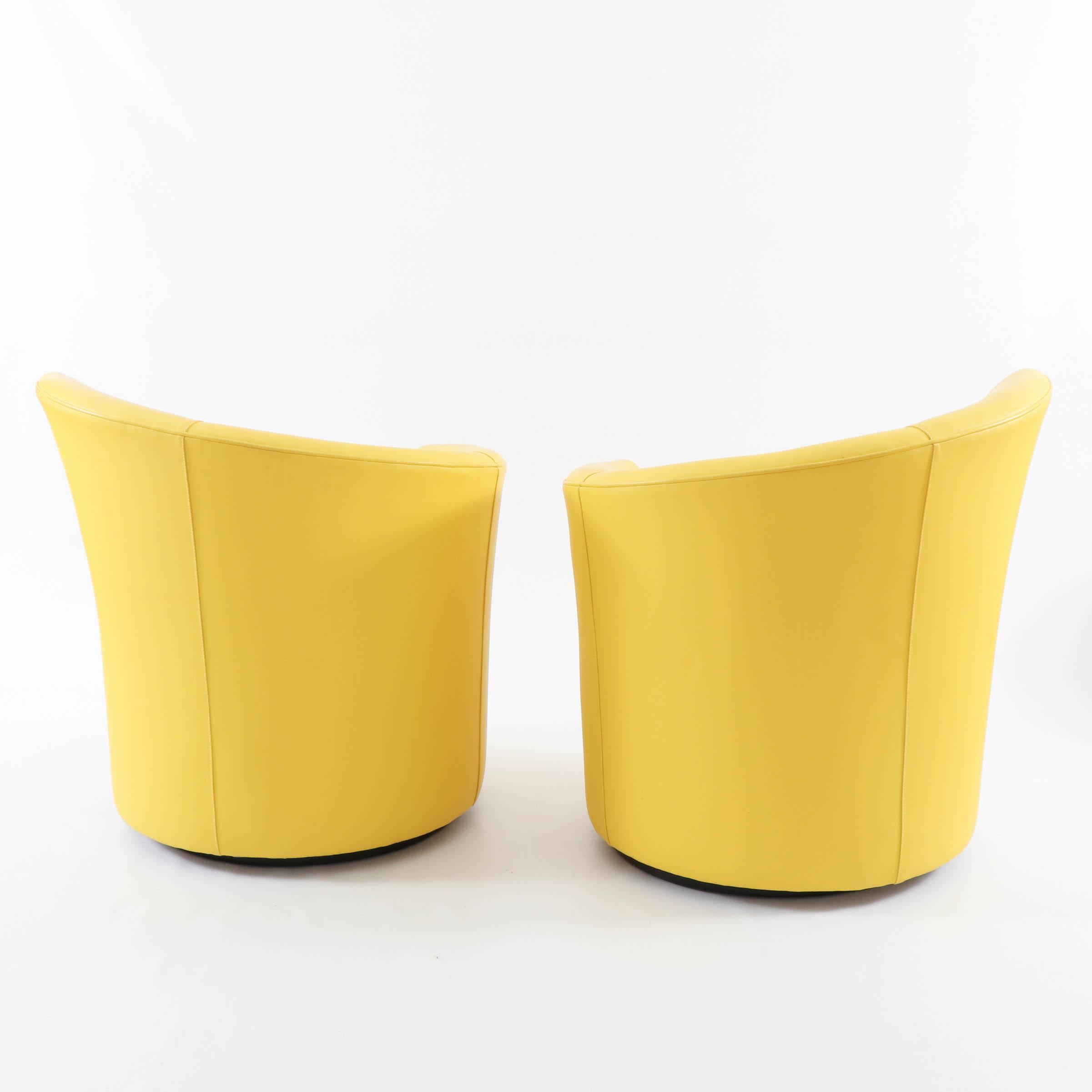 Pair of Modernist Lemon Yellow Leather Asymmetrical Back Swivel Chairs