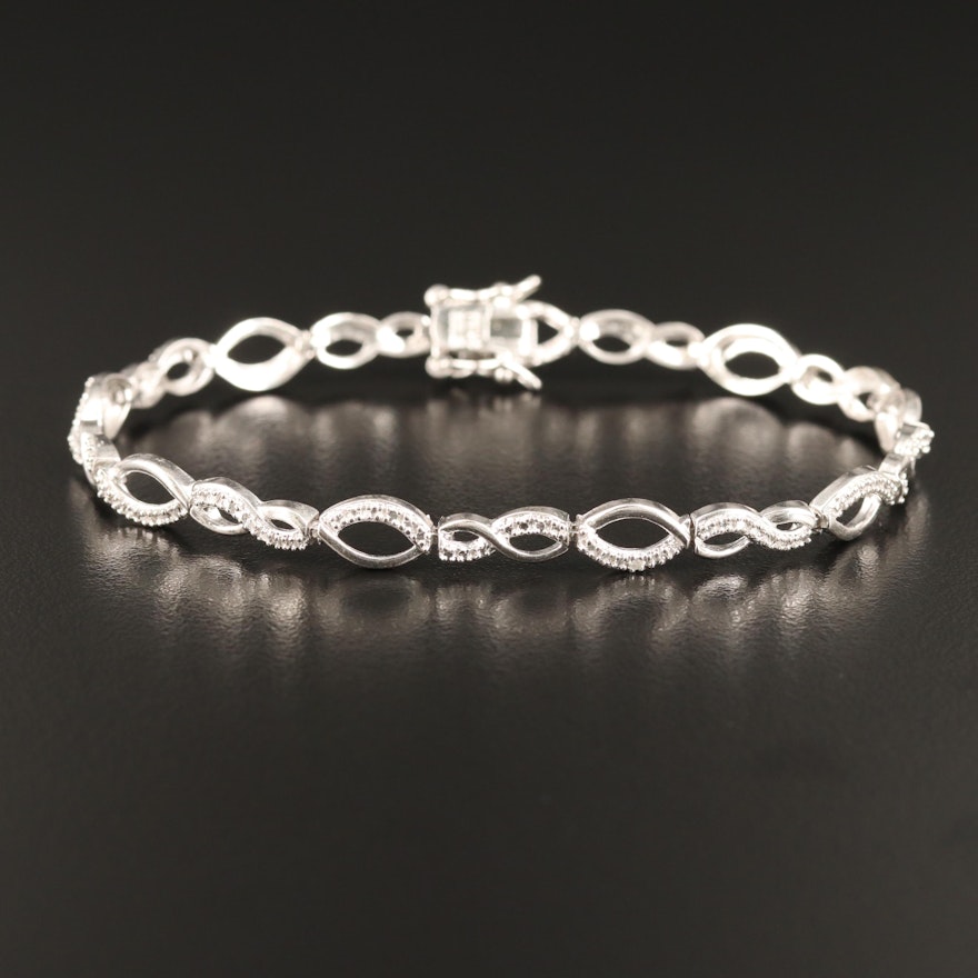 Sterling Silver Diamond Link Bracelet with Twisting Design