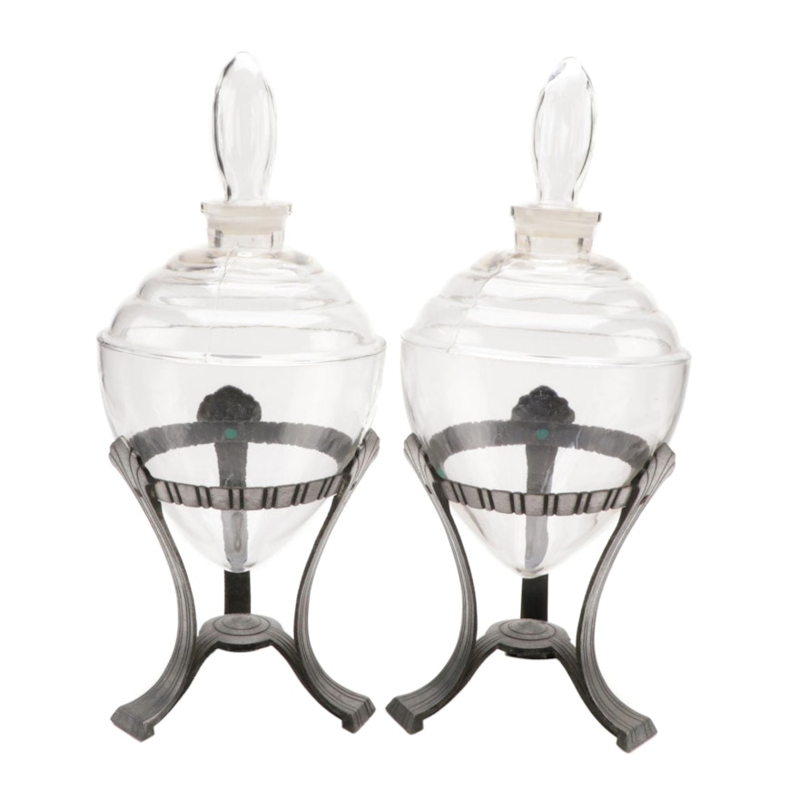 Pair of Lidded Glass Vessels with Metal Stands