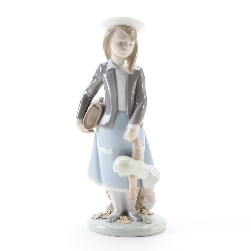 Lladró "Autumn Girl with Doll" Porcelain Figurine, Late 20th Century