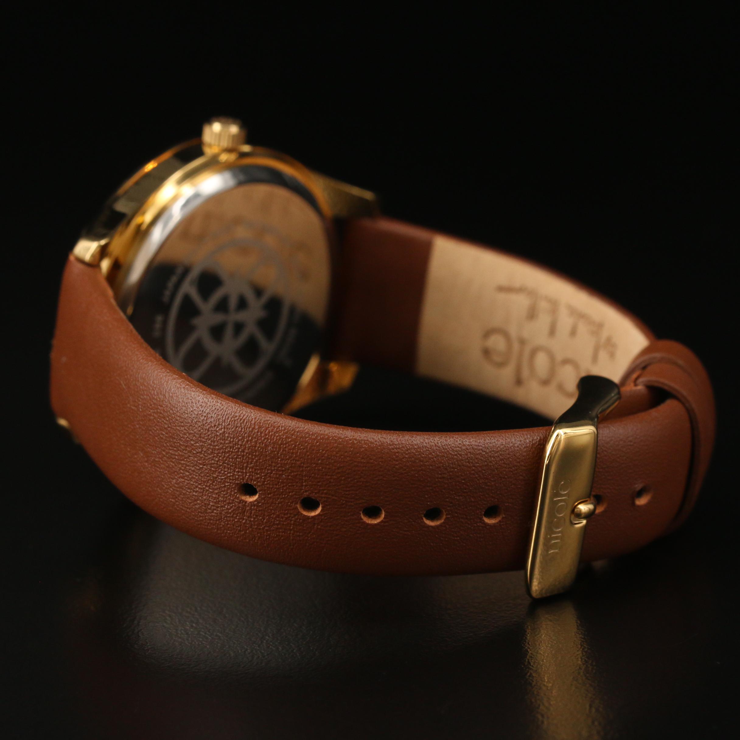 Nicole by Nicole Miller Crystal and Gold Tone Quartz Watch